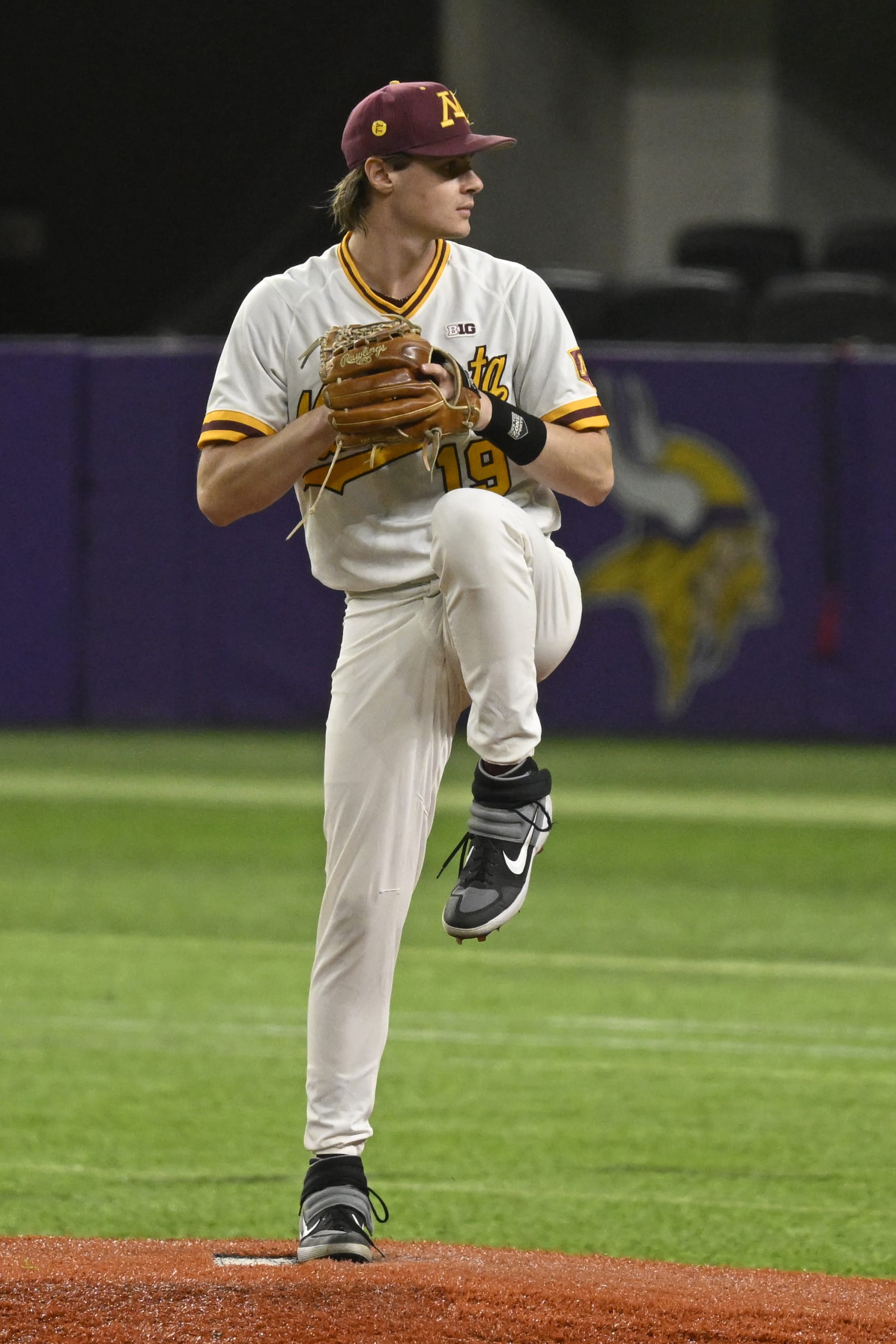 MINNEAPOLIS, MN - MARCH 04: Minnesota Golden Gophers pitcher George Klassen (19) delivers a pitch during a Cambria College Classic game between the Minnesota Golden Gophers and Ole Miss Rebels on March 4, 2023, at U.S. Bank Stadium in Minneapolis, MN.(Photo by Nick Wosika/Icon Sportswire via Getty Images)