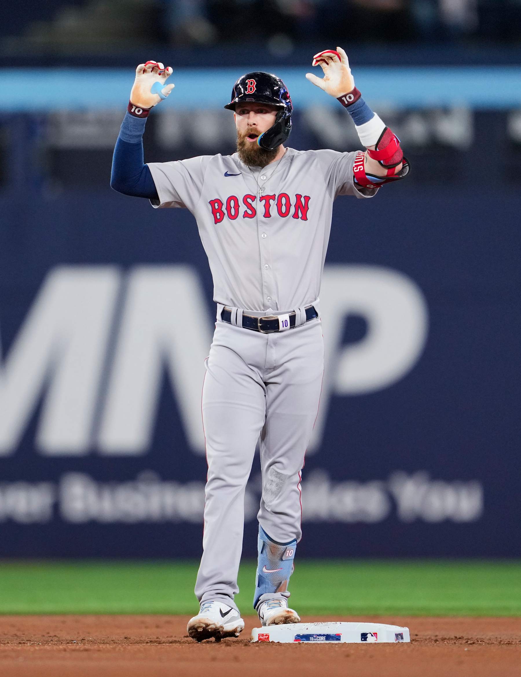 TORONTO, ON - SEPTEMBER 24: Trevor Story #10 of the Boston Red Sox celebrates his double against the Toronto Blue Jays during the second inning in their MLB game at the Rogers Centre on September 24, 2024 in Toronto, Ontario, Canada. (Photo by Mark Blinch/Getty Images)