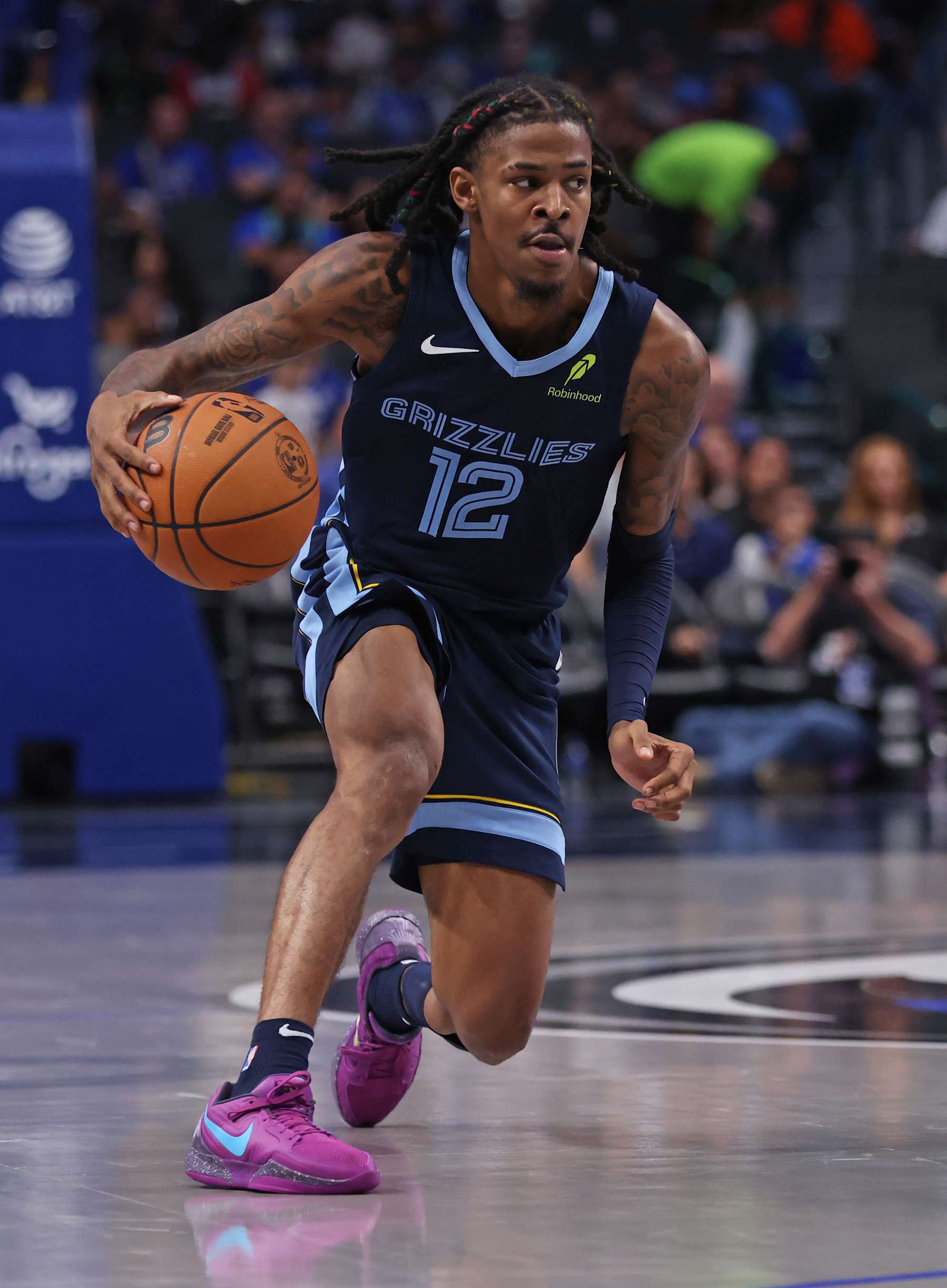 DALLAS, TX - OCTOBER 7: Ja Morant #12 of the Memphis Grizzlies handles the ball against the Dallas Mavericks in the second half of an NBA pre-season game at American Airlines Center on October 7, 2024 in Dallas, Texas. NOTE TO USER: User expressly acknowledges and agrees that, by downloading and or using this photograph, User is consenting to the terms and conditions of the Getty Images License Agreement. (Photo by Ron Jenkins/Getty Images)