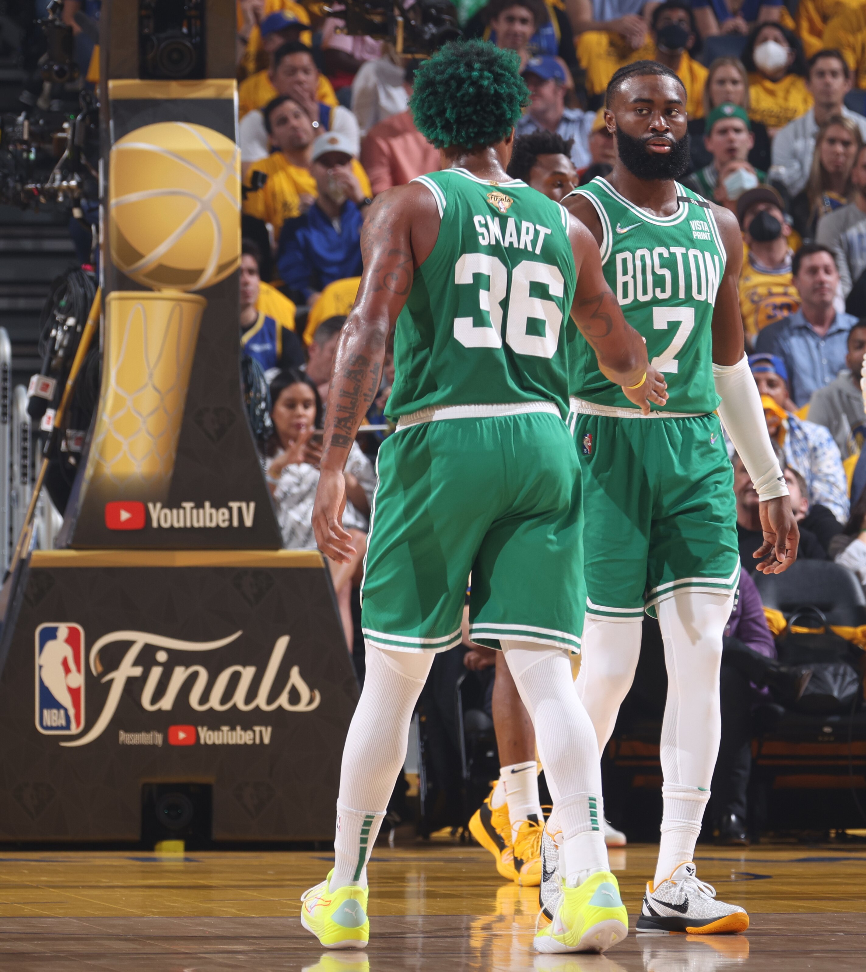 SAN FRANCISCO, CA - JUNE 5: Marcus Smart #36 and Jaylen Brown #7 of the Boston Celtics high five during Game Two of the 2022 NBA Finals on June 5, 2022 at Chase Center in San Francisco, California. NOTE TO USER: User expressly acknowledges and agrees that, by downloading and or using this photograph, user is consenting to the terms and conditions of Getty Images License Agreement. Mandatory Copyright Notice: Copyright 2022 NBAE (Photo by Nathaniel S. Butler/NBAE via Getty Images)