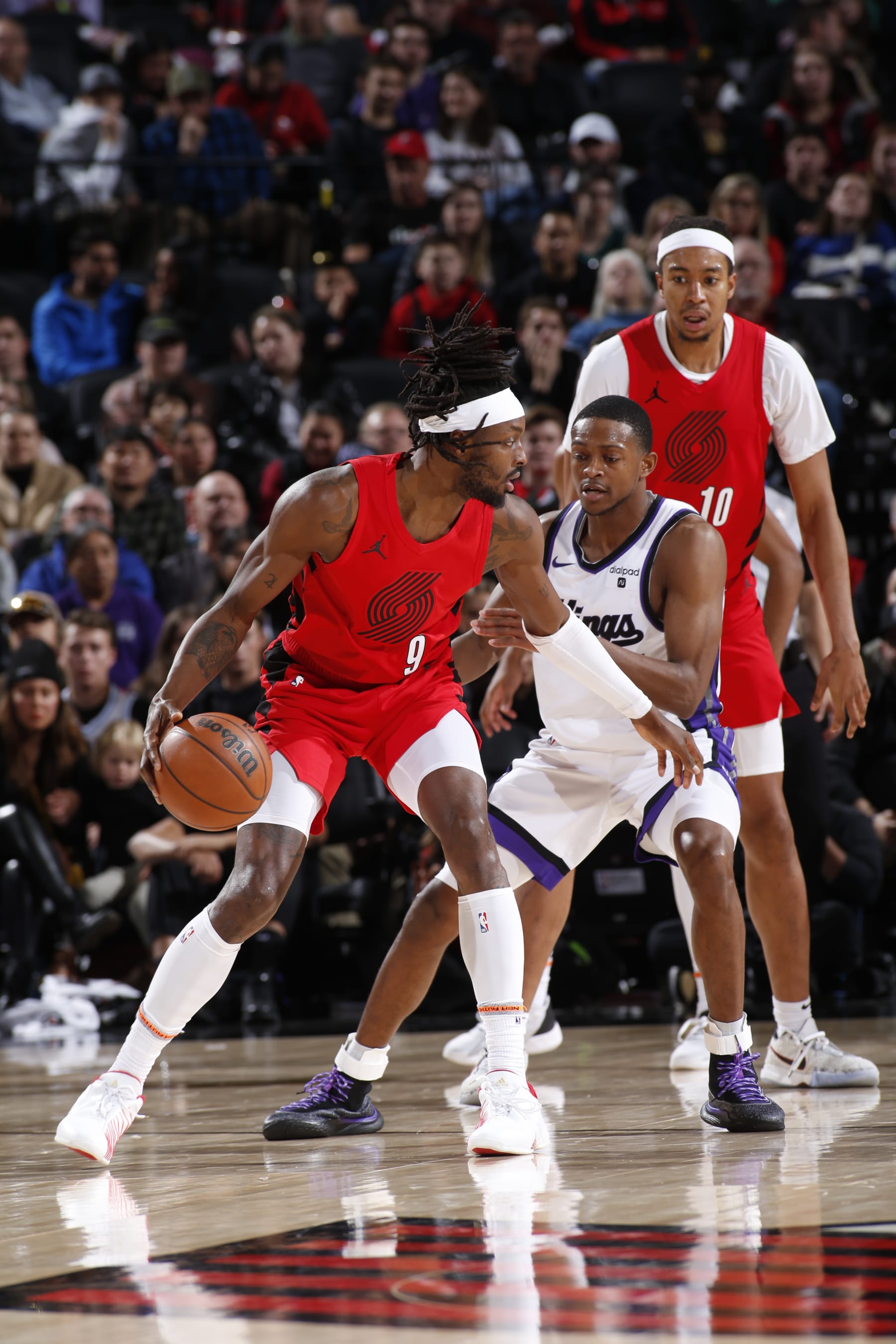 PORTLAND, OR - DECEMBER 26: Jerami Grant #9 of the Portland Trail Blazers handles the ball during the game against the Sacramento Kings on December 26, 2023 at the Moda Center Arena in Portland, Oregon. NOTE TO USER: User expressly acknowledges and agrees that, by downloading and or using this photograph, user is consenting to the terms and conditions of the Getty Images License Agreement. Mandatory Copyright Notice: Copyright 2023 NBAE (Photo by Cameron Browne/NBAE via Getty Images)