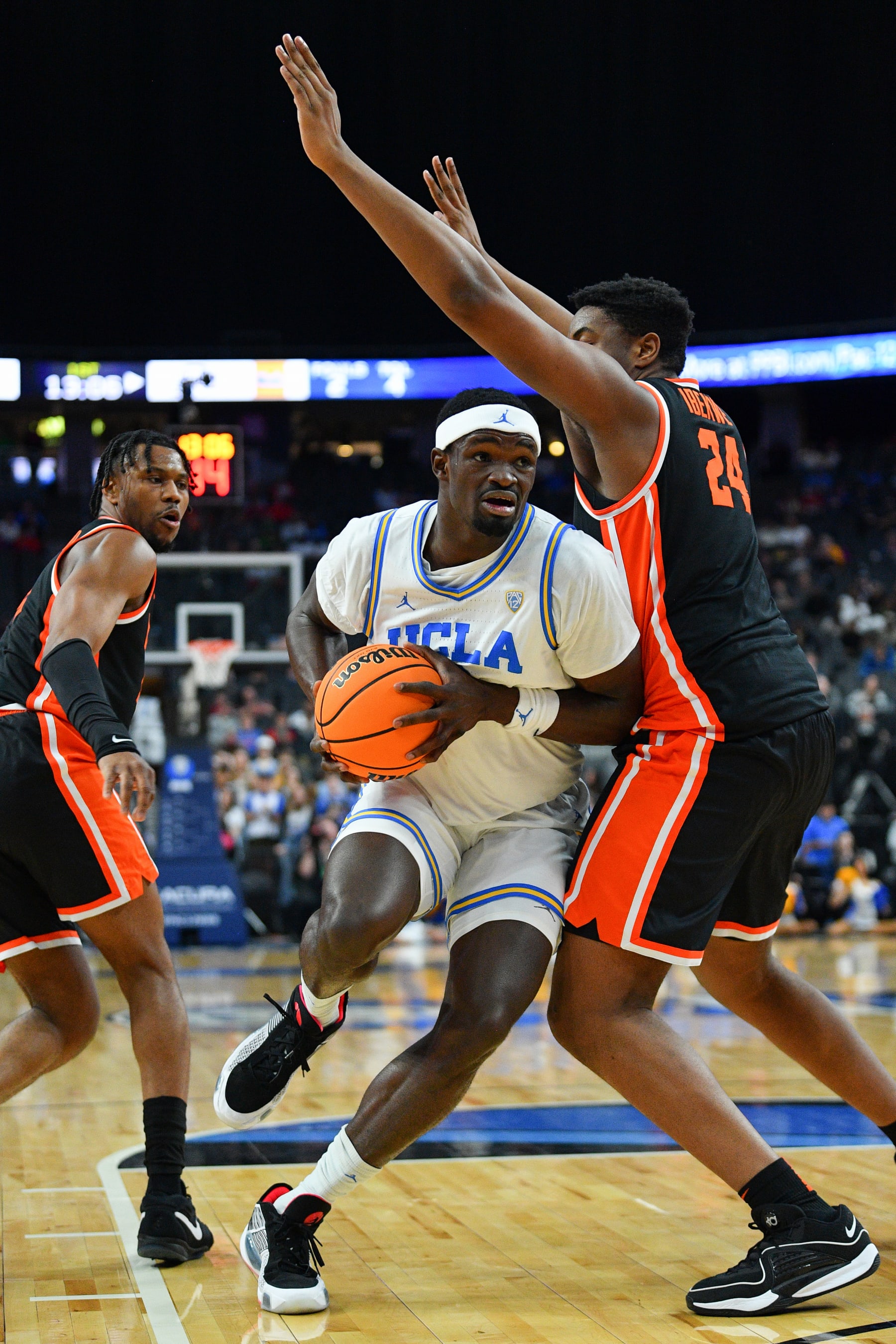 LAS VEGAS, NV - MARCH 13: UCLA Bruins forward Adem Bona (3) drives to the basket during the first round game of the men's Pac-12 Tournament  between the Oregon State Beavers and the UCLA Bruins on March 13, 2024, at the T-Mobile Arena in Las Vegas, NV. (Photo by Brian Rothmuller/Icon Sportswire via Getty Images)