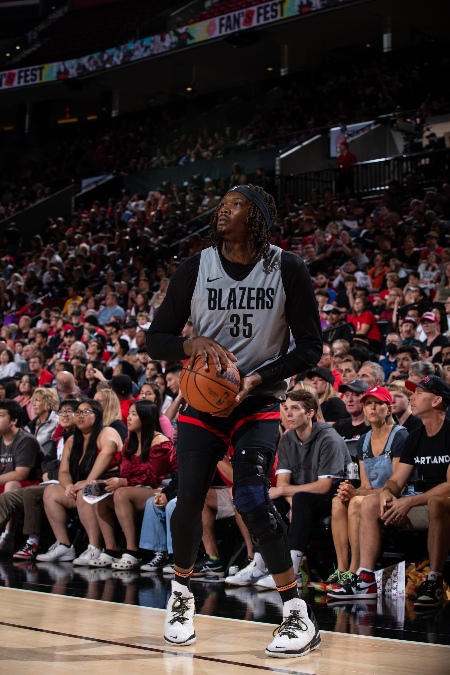PORTLAND, OR - OCTOBER 8: Robert Williams #35 of the Portland Trail Blazers three point basket during the fan fest on October 8, 2023 at the Moda Center Arena in Portland, Oregon. NOTE TO USER: User expressly acknowledges and agrees that, by downloading and or using this photograph, user is consenting to the terms and conditions of the Getty Images License Agreement. Mandatory Copyright Notice: Copyright 2023 NBAE (Photo by Cameron Browne/NBAE via Getty Images)