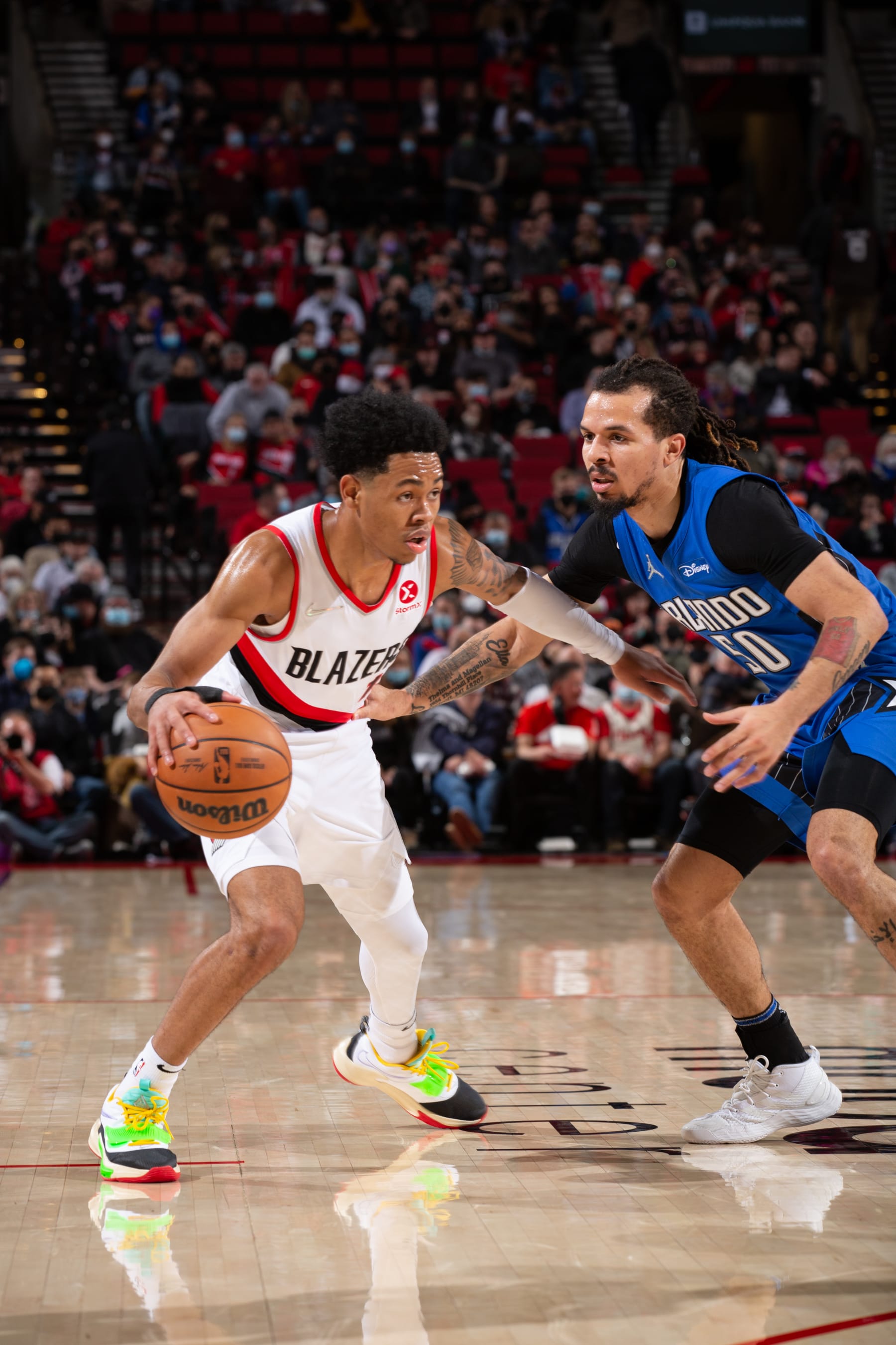 PORTLAND, OR - FEBRUARY 8:  Anfernee Simons #1 of the Portland Trail Blazers drives to the basket during the game against the Orlando Magic on February 8, 2022 at the Moda Center Arena in Portland, Oregon. NOTE TO USER: User expressly acknowledges and agrees that, by downloading and or using this photograph, user is consenting to the terms and conditions of the Getty Images License Agreement. Mandatory Copyright Notice: Copyright 2022 NBAE (Photo by Cameron Browne/NBAE via Getty Images)