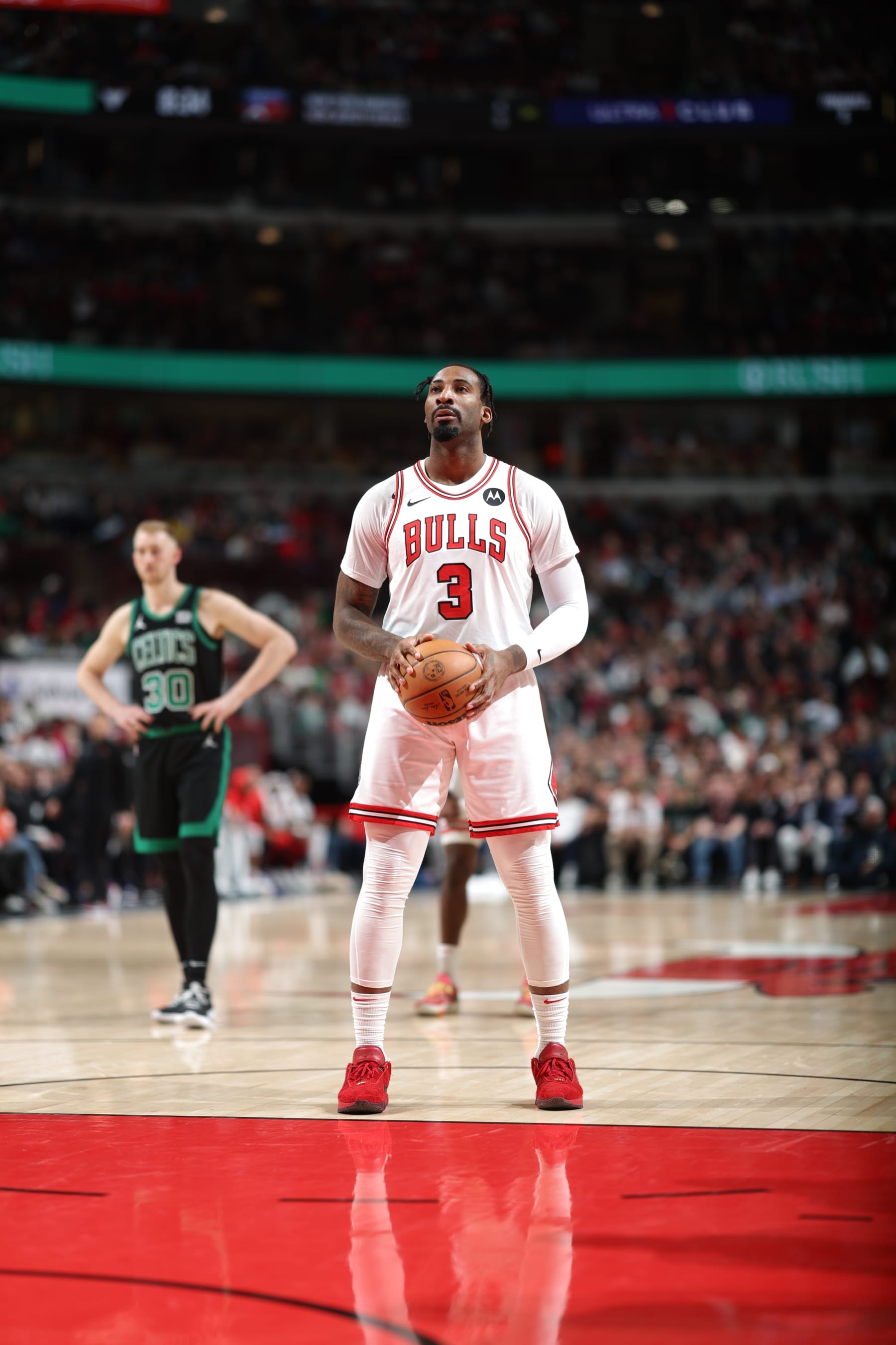 CHICAGO, IL - FEBRUARY 22: Andre Drummond #3 of the Chicago Bulls prepares to shoot a free throw during the game against the Boston Celtics on February 22, 2024 at United Center in Chicago, Illinois. NOTE TO USER: User expressly acknowledges and agrees that, by downloading and or using this photograph, User is consenting to the terms and conditions of the Getty Images License Agreement. Mandatory Copyright Notice: Copyright 2024 NBAE (Photo by Jeff Haynes/NBAE via Getty Images)