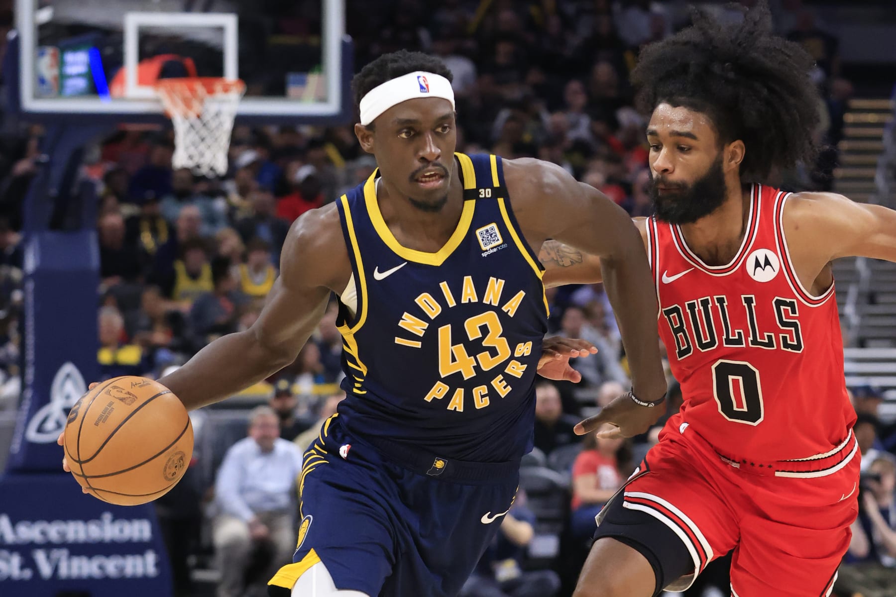 INDIANAPOLIS, INDIANA - MARCH 13: Pascal Siakam #43 of the Indiana Pacers drives to the basket against Coby White #0 of the Chicago Bulls at Gainbridge Fieldhouse on March 13, 2024 in Indianapolis, Indiana. NOTE TO USER: User expressly acknowledges and agrees that, by downloading and or using this photograph, User is consenting to the terms and conditions of the Getty Images License Agreement. (Photo by Justin Casterline/Getty Images)