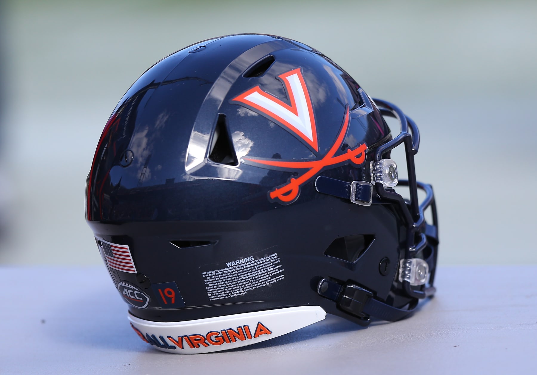 CHARLOTTESVILLE, VA - OCTOBER 29: Virginia Cavaliers helmet resting on a table during a college football game between the Miami Hurricanes and the Virginia Cavaliers on October 29, 2022, at Scott Stadium in Charlottesville, VA. (Photo by Lee Coleman/Icon Sportswire via Getty Images)