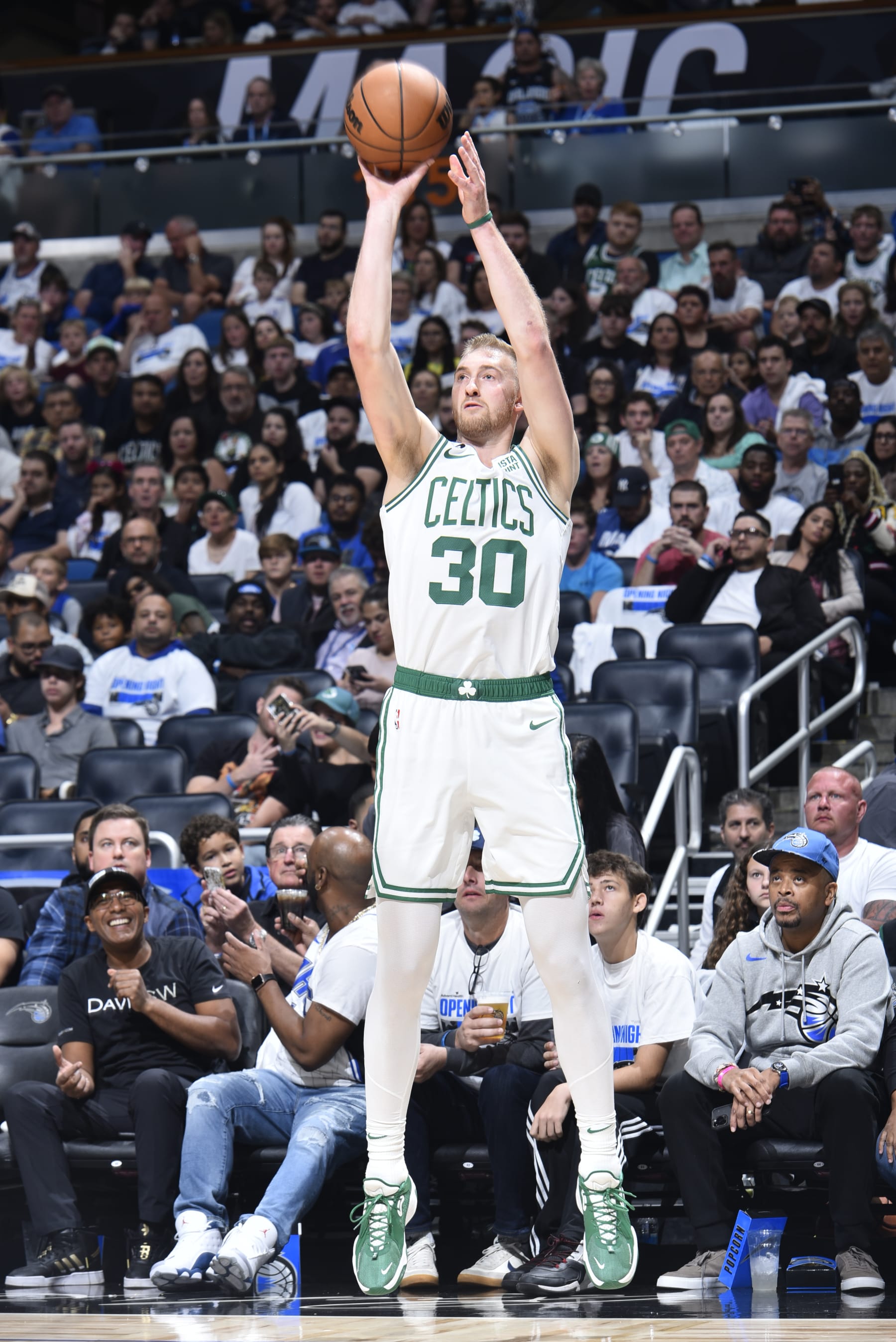 ORLANDO, FL - OCTOBER 22: Sam Hauser #30 of the Boston Celtics shoots a three point basket during the game against the Orlando Magic on October 22, 2022 at Amway Center in Orlando, Florida. NOTE TO USER: User expressly acknowledges and agrees that, by downloading and or using this photograph, User is consenting to the terms and conditions of the Getty Images License Agreement. Mandatory Copyright Notice: Copyright 2022 NBAE (Photo by Gary Bassing/NBAE via Getty Images)