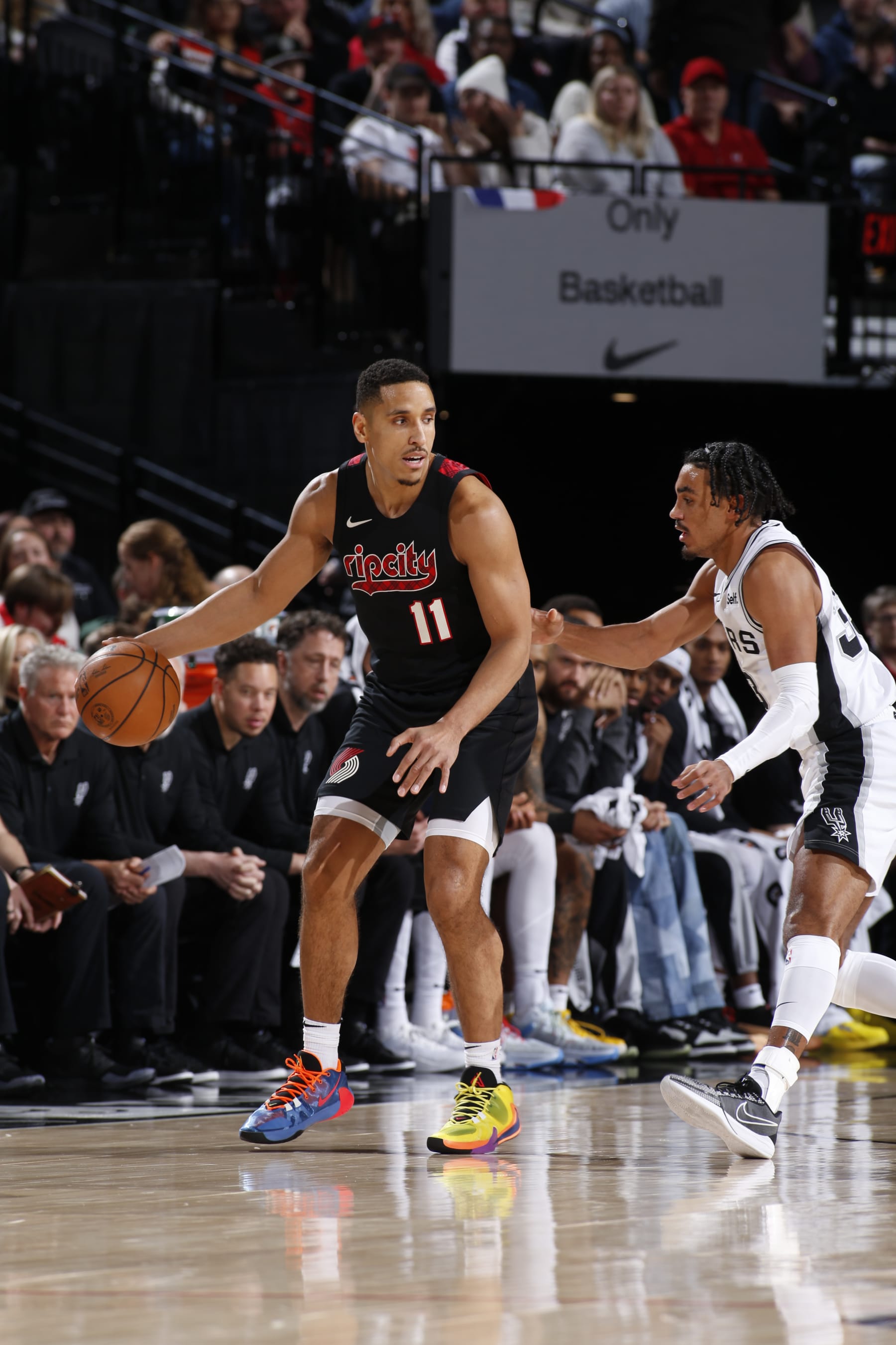 PORTLAND, OR - DECEMBER 29: Malcolm Brogdon #11 of the Portland Trail Blazers handles the ball during the game against the San Antonio Spurs on December 29, 2023 at the Moda Center Arena in Portland, Oregon. NOTE TO USER: User expressly acknowledges and agrees that, by downloading and or using this photograph, user is consenting to the terms and conditions of the Getty Images License Agreement. Mandatory Copyright Notice: Copyright 2023 NBAE (Photo by Cameron Browne/NBAE via Getty Images)