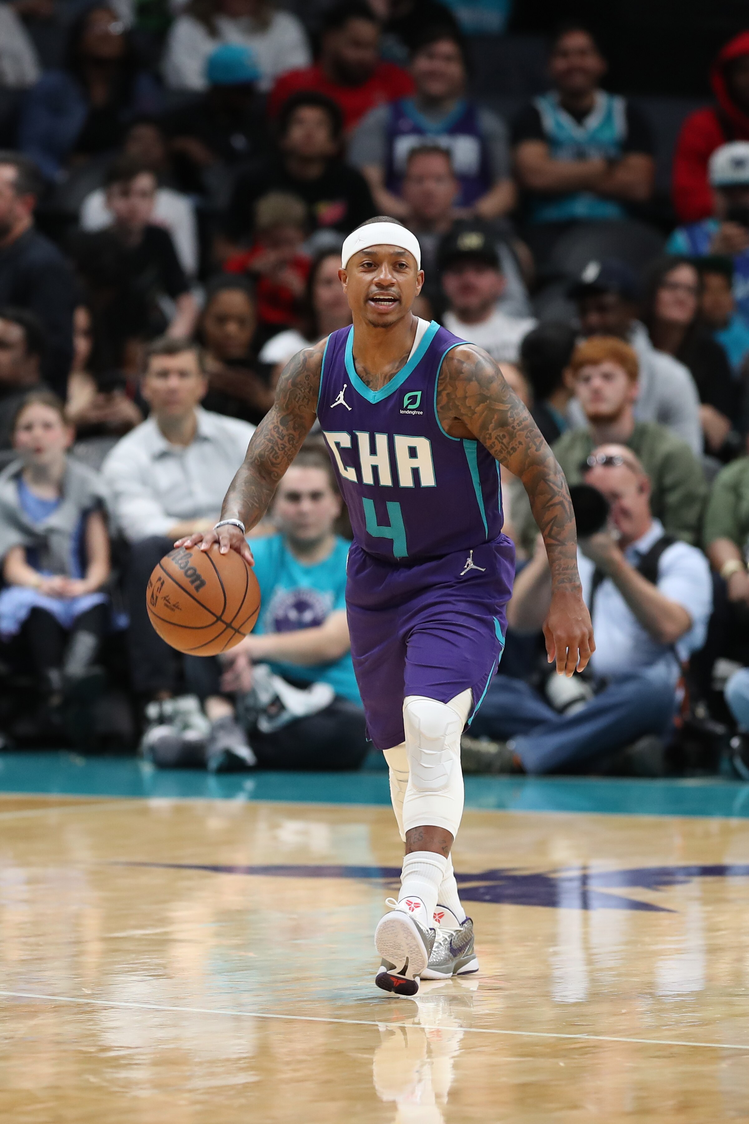 CHARLOTTE, NC - APRIL 10: Isaiah Thomas #4 of the Charlotte Hornets handles the ball during the game against the Washington Wizards on April 10, 2022 at Spectrum Center in Charlotte, North Carolina. NOTE TO USER: User expressly acknowledges and agrees that, by downloading and or using this photograph, User is consenting to the terms and conditions of the Getty Images License Agreement. Mandatory Copyright Notice: Copyright 2022 NBAE (Photo by Kent Smith/NBAE via Getty Images)