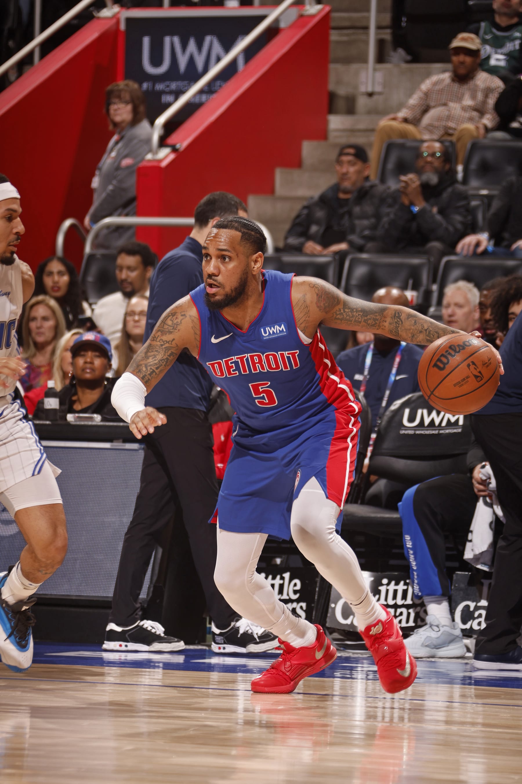DETROIT, MI - FEBRUARY 4: Monte Morris #5 of the Detroit Pistons handles the ball during the game against the Detroit Pistons on February 4, 2024 at Little Caesars Arena in Detroit, Michigan. NOTE TO USER: User expressly acknowledges and agrees that, by downloading and/or using this photograph, User is consenting to the terms and conditions of the Getty Images License Agreement. Mandatory Copyright Notice: Copyright 2024 NBAE (Photo by Brian Sevald/NBAE via Getty Images)