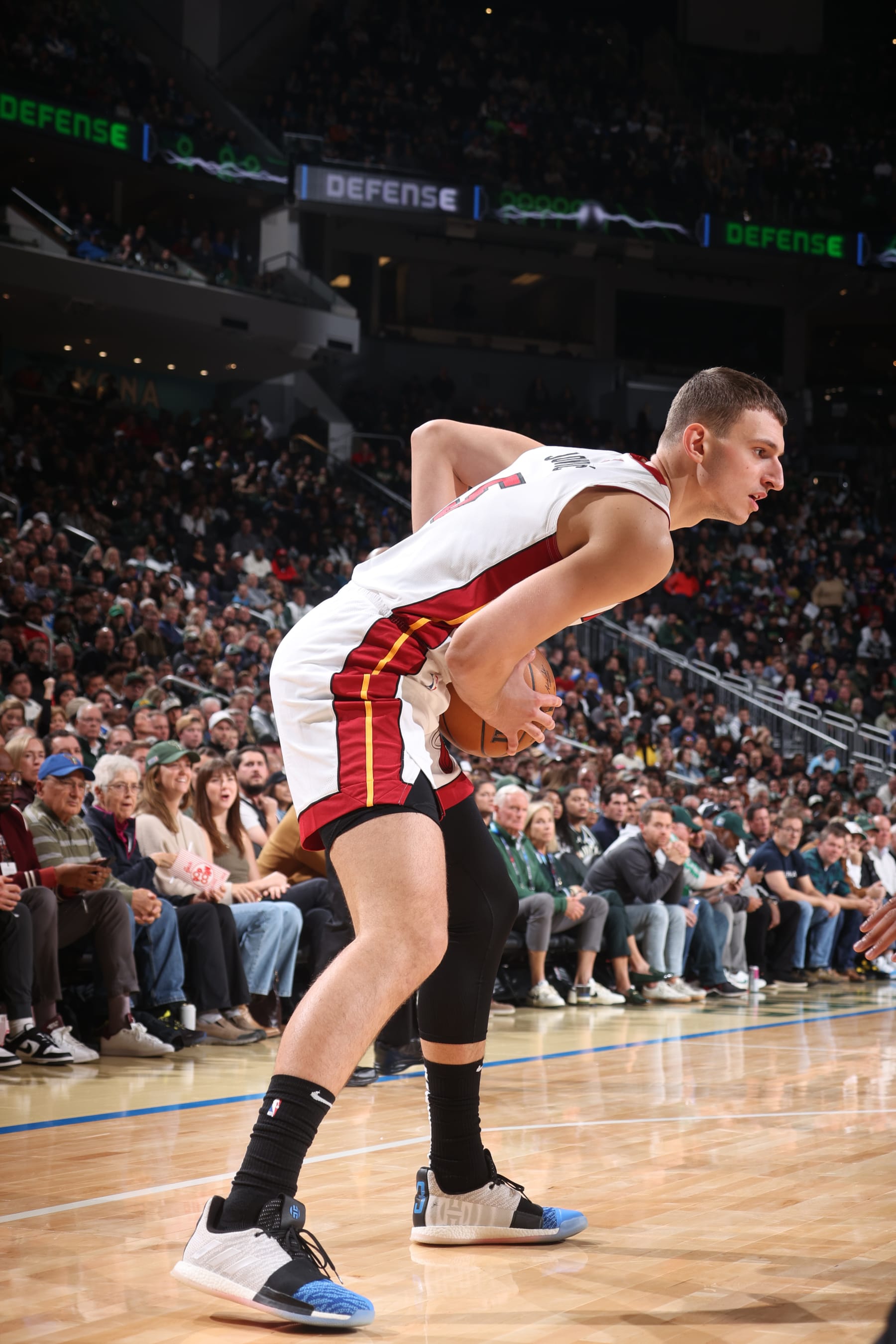MILWAUKEE, WI - OCTOBER 30: Nikola Jovic #5 of the Miami Heat handles the ball during the game against the Milwaukee Bucks on October 30, 2023 at the Fiserv Forum Center in Milwaukee, Wisconsin. NOTE TO USER: User expressly acknowledges and agrees that, by downloading and or using this Photograph, user is consenting to the terms and conditions of the Getty Images License Agreement. Mandatory Copyright Notice: Copyright 2023 NBAE (Photo by Nathaniel S. Butler/NBAE via Getty Images).