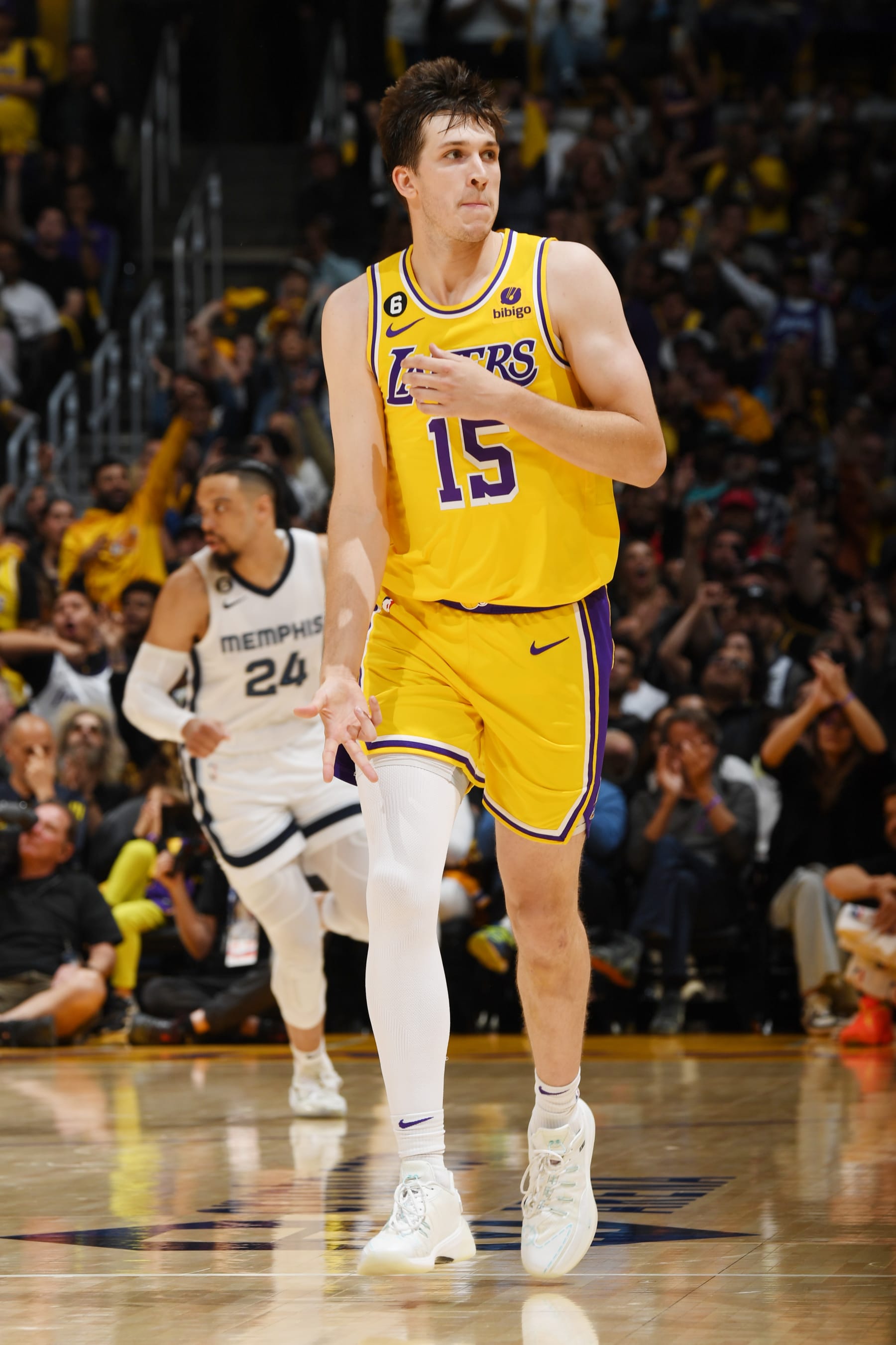 LOS ANGELES, CA - APRIL 24: Austin Reaves #15 of the Los Angeles Lakers celebrates a three point basket during Round One Game Four of the 2023 NBA Playoffs against the Memphis Grizzlies on April 24, 2023 at Crypto.Com Arena in Los Angeles, California. NOTE TO USER: User expressly acknowledges and agrees that, by downloading and/or using this Photograph, user is consenting to the terms and conditions of the Getty Images License Agreement. Mandatory Copyright Notice: Copyright 2023 NBAE (Photo by Andrew D. Bernstein/NBAE via Getty Images)