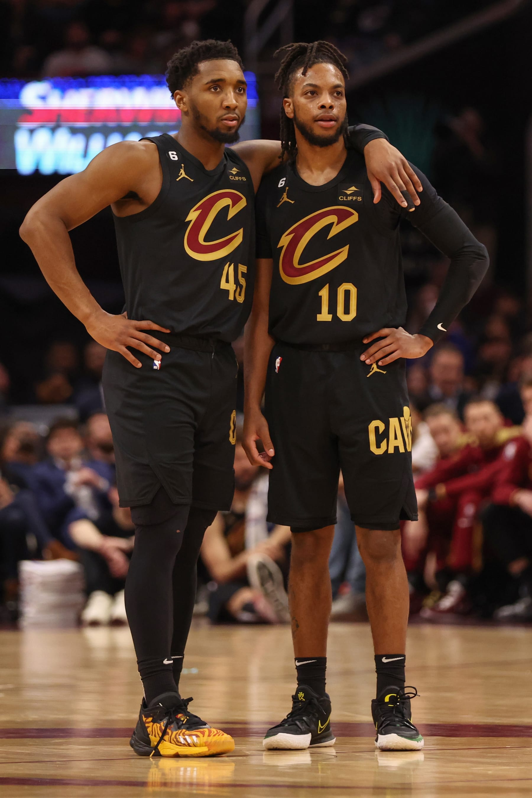 CLEVELAND, OH - MARCH 15:  Darius Garland #10 and Donovan Mitchell #45 of the Cleveland Cavaliers looks on during the game on March 15, 2023 at Rocket Mortgage FieldHouse in Cleveland, Ohio. NOTE TO USER: User expressly acknowledges and agrees that, by downloading and/or using this Photograph, user is consenting to the terms and conditions of the Getty Images License Agreement. Mandatory Copyright Notice: Copyright 2023 NBAE (Photo by  Lauren Bacho/NBAE via Getty Images)