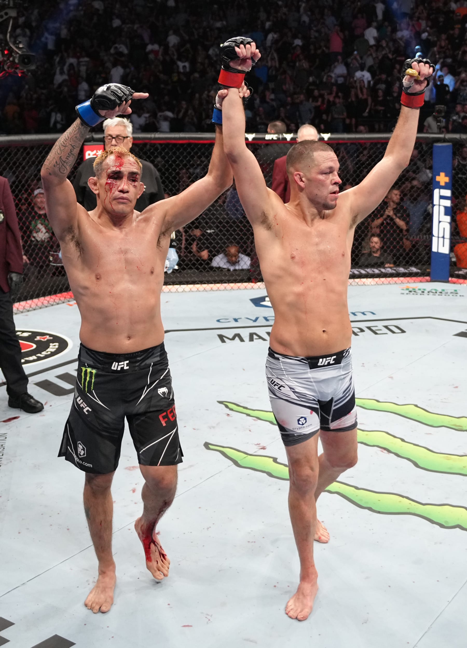 LAS VEGAS, NEVADA - SEPTEMBER 10: (R-L) Nate Diaz and Tony Ferguson pay each other respect after their welterweight fight during the UFC 279 event at T-Mobile Arena on September 10, 2022 in Las Vegas, Nevada. (Photo by Jeff Bottari/Zuffa LLC)