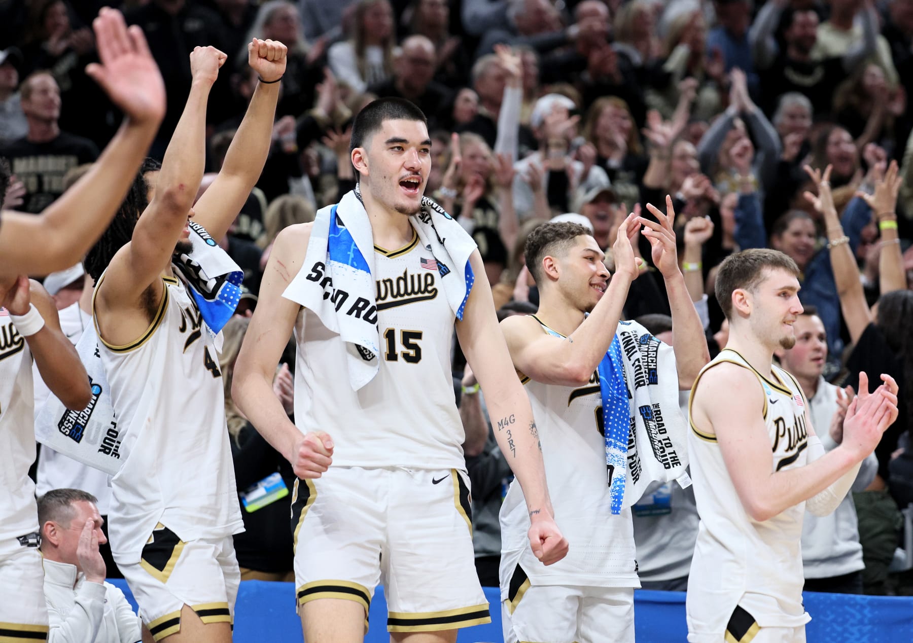 INDIANAPOLIS, INDIANA - MARCH 24: Zach Edey #15 of the Purdue Boilermakers celebrates a basket from the bench against the Utah State Aggies during the second half in the second round of the NCAA Men's Basketball Tournament at Gainbridge Fieldhouse on March 24, 2024 in Indianapolis, Indiana. (Photo by Andy Lyons/Getty Images)