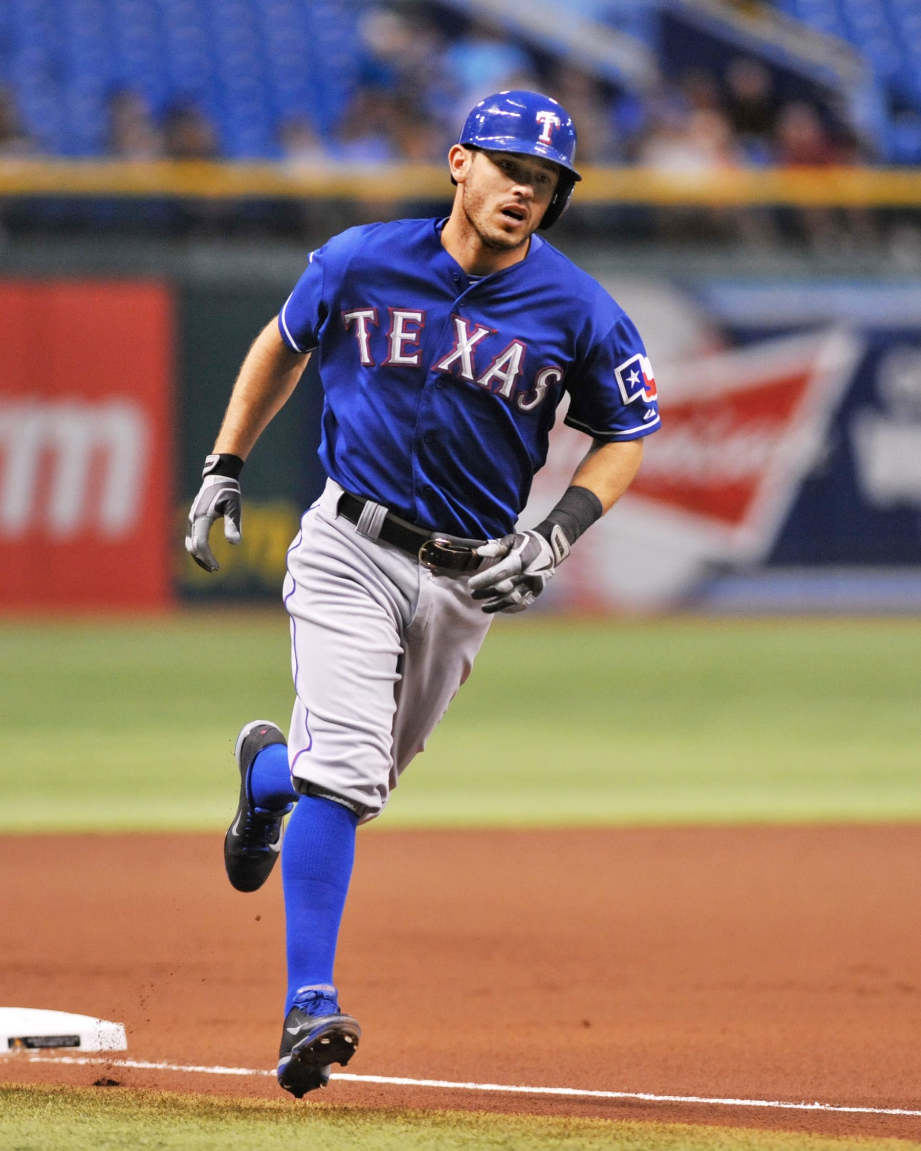 ST. PETERSBURG, FL - SEPTEMBER 17: Infielder Ian Kinsler #5 of the Texas Rangers rounds 3rd base after a home run on the first pitch of the game against the Tampa Bay Rays September 17, 2013 at Tropicana Field in St. Petersburg, Florida. (Photo by Al Messerschmidt/Getty Images)