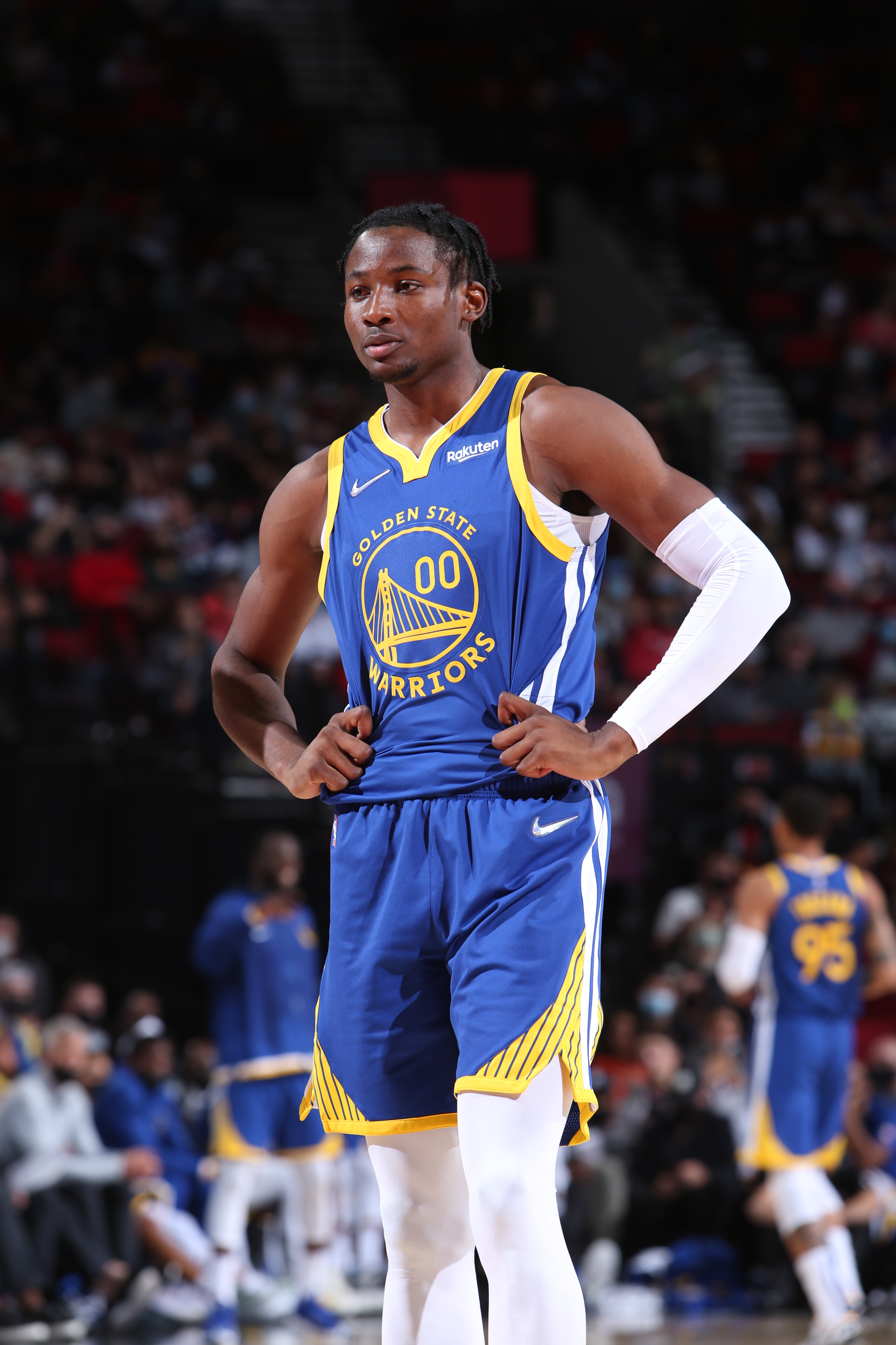 PORTLAND, OR - OCTOBER 4: Jonathan Kuminga #00 of the Golden State Warriors looks on during the game against the Portland Trail Blazers on October 4, 2021 at the Moda Center Arena in Portland, Oregon. NOTE TO USER: User expressly acknowledges and agrees that, by downloading and or using this photograph, user is consenting to the terms and conditions of the Getty Images License Agreement. Mandatory Copyright Notice: Copyright 2021 NBAE (Photo by Sam Forencich/NBAE via Getty Images)