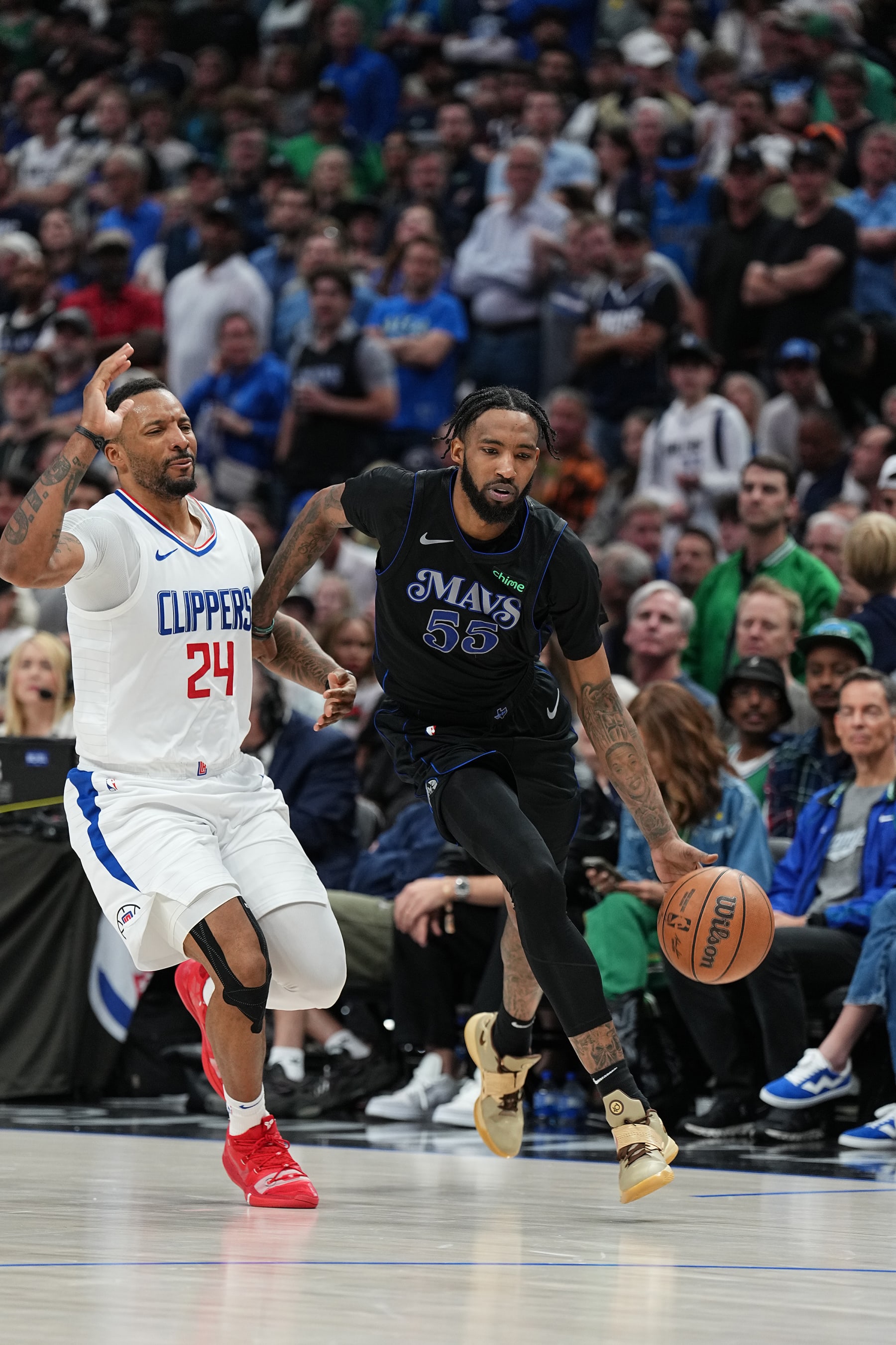 DALLAS, TX - MAY 3: Derrick Jones Jr. #55 of the Dallas Mavericks drives to the basket during the game against the LA Clippers during Round 1 Game 6 of the 2024 NBA Playoffs  on May 3, 2024  at the American Airlines Center in Dallas, Texas. NOTE TO USER: User expressly acknowledges and agrees that, by downloading and or using this photograph, User is consenting to the terms and conditions of the Getty Images License Agreement. Mandatory Copyright Notice: Copyright 2024 NBAE (Photo by Glenn James/NBAE via Getty Images)