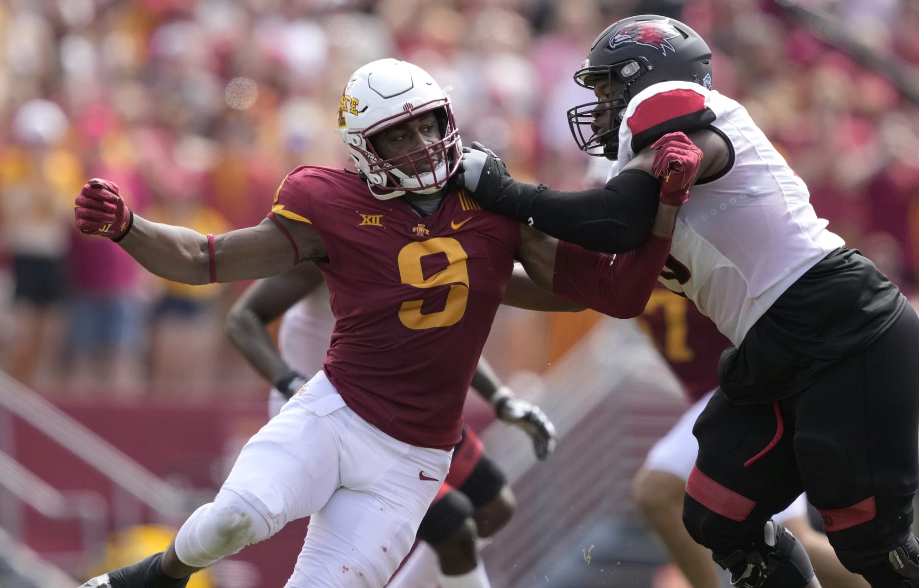 Iowa State defensive end Will McDonald IV (9) gets past Southeast Missouri State offensive lineman Terry Cook (76) during the first half of an NCAA college football game, Saturday, Sept. 3, 2022, in Ames, Iowa. (AP Photo/Matthew Putney)