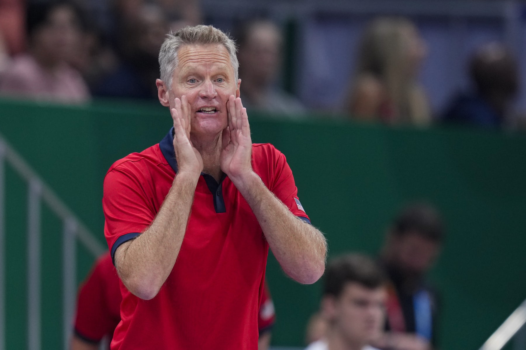 U.S. head coach Steve Kerr yells to his team as they played against New Zealand during the first half of a Basketball World Cup group C match in Manila, Saturday, Aug. 26, 2023. (AP Photo/Michael Conroy)