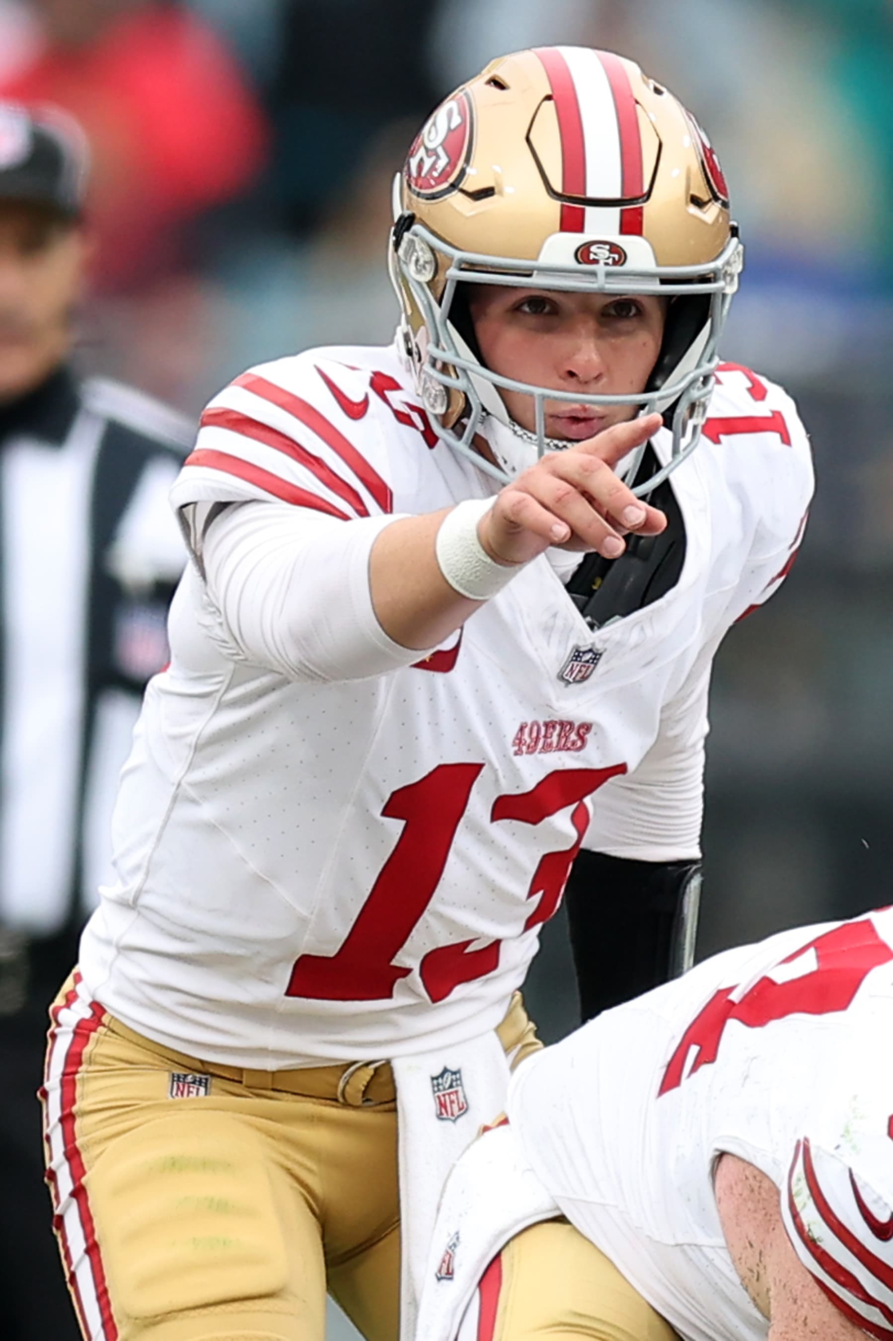 JACKSONVILLE, FLORIDA - NOVEMBER 12: Brock Purdy #13 of the San Francisco 49ers calls a play during the second quarter against the Jacksonville Jaguars at EverBank Stadium on November 12, 2023 in Jacksonville, Florida. (Photo by Mike Carlson/Getty Images)