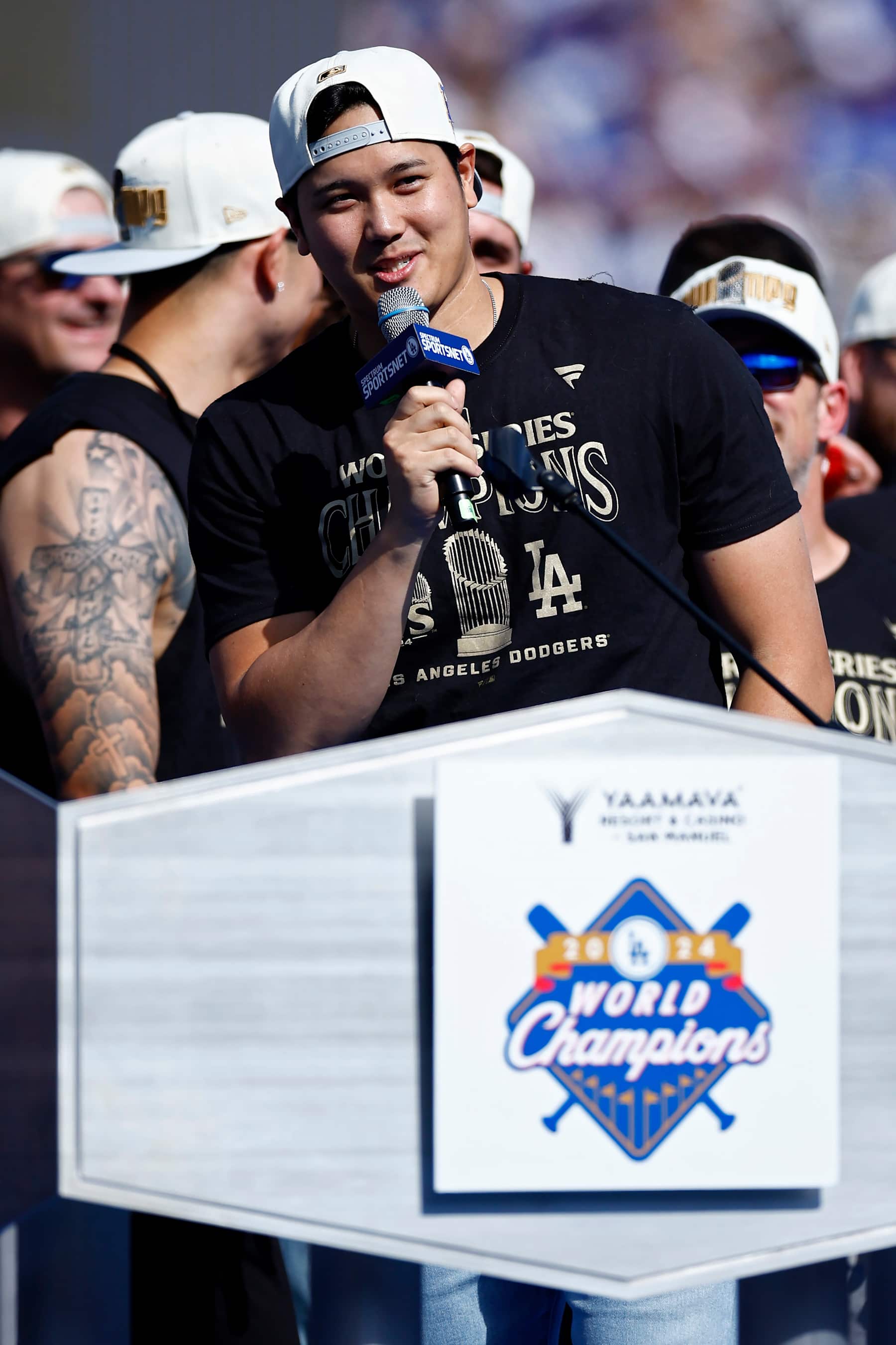 LOS ANGELES, CALIFORNIA - NOVEMBER 01: Shohei Ohtani #17 of the Los Angeles Dodgers speaks during the 2024 World Series Celebration Show at Dodger Stadium on November 01, 2024 in Los Angeles, California.  (Photo by Ronald Martinez/Getty Images)
