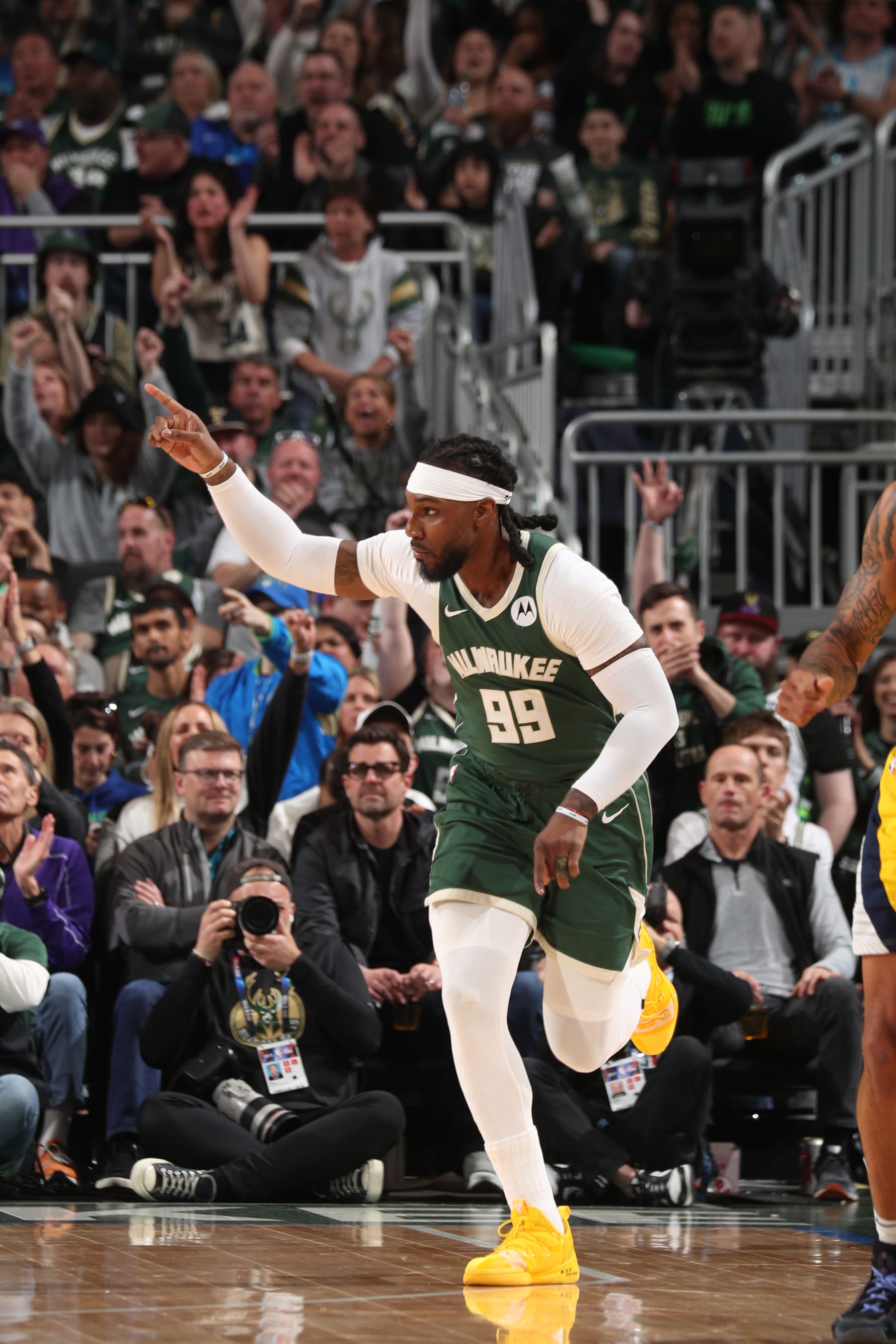 MILWAUKEE, WI - APRIL 21: Jae Crowder #99 of the Milwaukee Bucks celebrates during the game against the Indiana Pacers during Round 1 Game 1 of the 2024 NBA Playoffs on April 21, 2024 at the Fiserv Forum Center in Milwaukee, Wisconsin. NOTE TO USER: User expressly acknowledges and agrees that, by downloading and or using this Photograph, user is consenting to the terms and conditions of the Getty Images License Agreement. Mandatory Copyright Notice: Copyright 2024 NBAE (Photo by Gary Dineen/NBAE via Getty Images). MILWAUKEE, WI - APRIL 21: Jae Crowder #99 of the Milwaukee Bucks celebrates during the game against the Indiana Pacers during Round 1 Game 1 of the 2024 NBA Playoffs on April 21, 2024 at the Fiserv Forum Center in Milwaukee, Wisconsin. NOTE TO USER: User expressly acknowledges and agrees that, by downloading and or using this Photograph, user is consenting to the terms and conditions of the Getty Images License Agreement. Mandatory Copyright Notice: Copyright 2024 NBAE (Photo by Gary Dineen/NBAE via Getty Images).