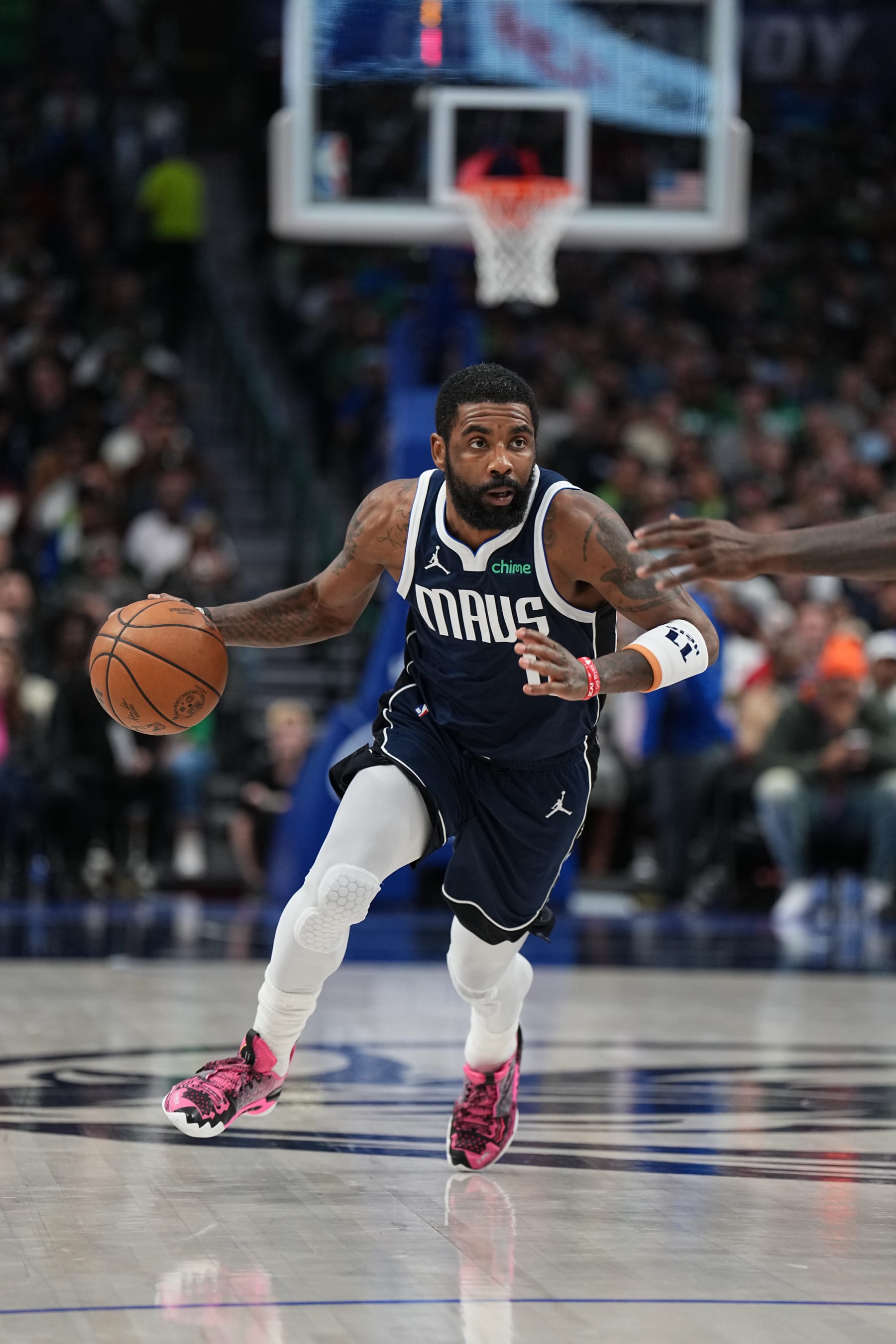DALLAS, TX - JANUARY 22: Kyrie Irving #11 of the Dallas Mavericks drives to the basket during the game against the Boston Celtics on January 22, 2024 at the American Airlines Center in Dallas, Texas. NOTE TO USER: User expressly acknowledges and agrees that, by downloading and or using this photograph, User is consenting to the terms and conditions of the Getty Images License Agreement. Mandatory Copyright Notice: Copyright 2024 NBAE (Photo by Glenn James/NBAE via Getty Images)