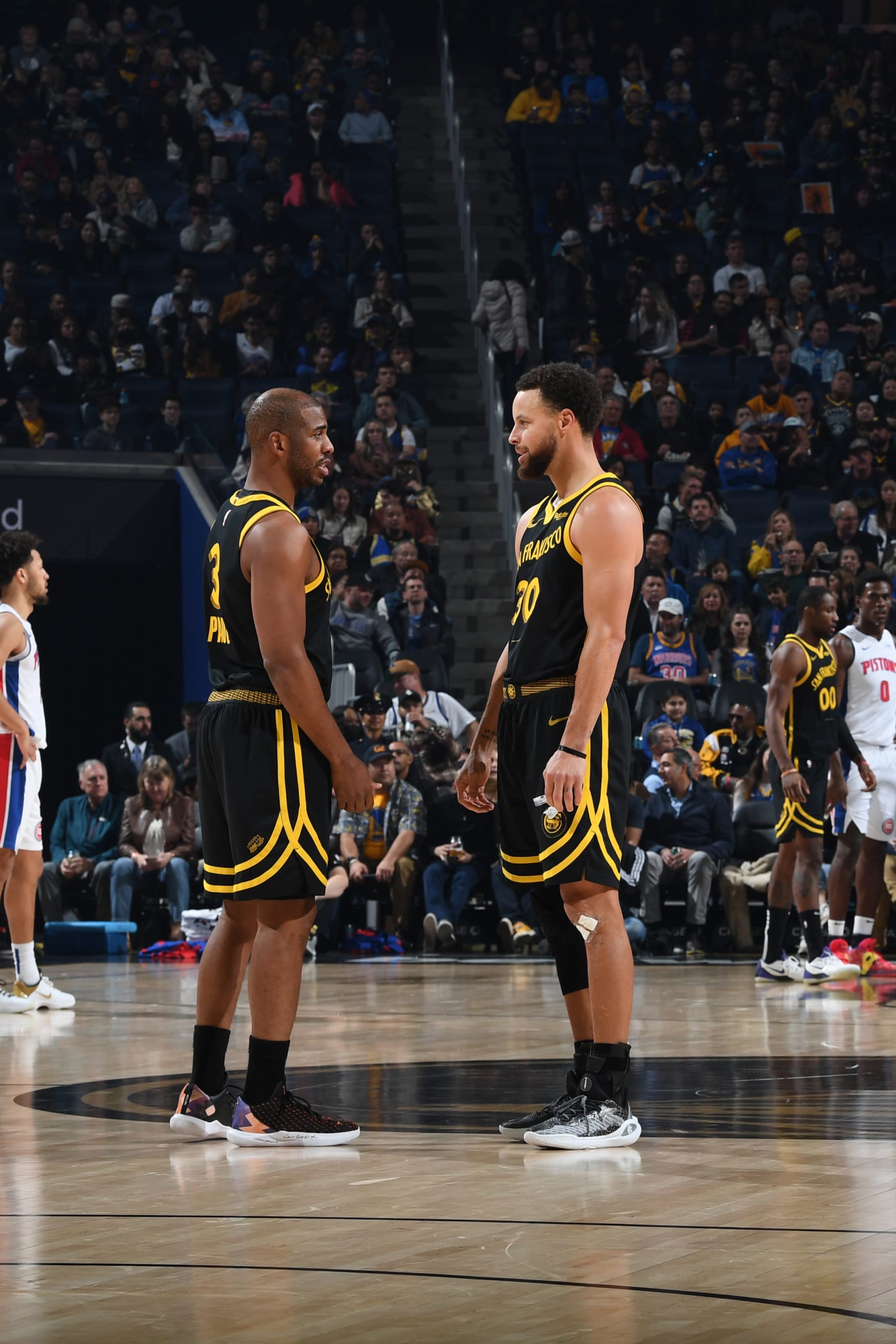 SAN FRANCISCO, CA - JANUARY 5: Chris Paul #3 talks to Stephen Curry #30 of the Golden State Warriors during the game against the Detroit Pistons on January 5, 2024 at Chase Center in San Francisco, California. NOTE TO USER: User expressly acknowledges and agrees that, by downloading and or using this photograph, user is consenting to the terms and conditions of Getty Images License Agreement. Mandatory Copyright Notice: Copyright 2024 NBAE (Photo by Noah Graham/NBAE via Getty Images)