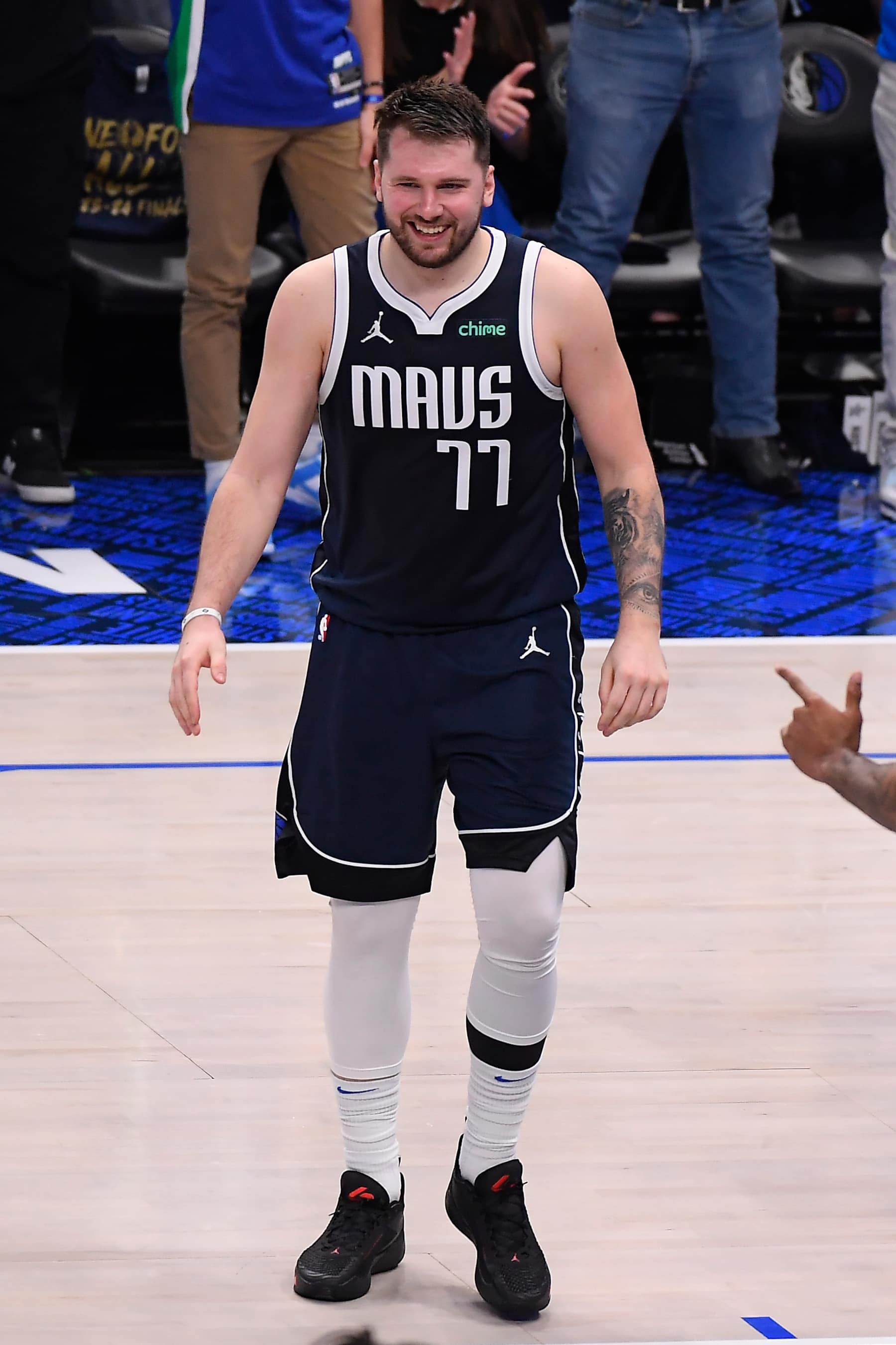 DALLAS, TX - JUNE 14: Luka Doncic #77 of the Dallas Mavericks smiles during the game against the Boston Celtics during Game 4 of the 2024 NBA Finals on June 14, 2024 at the American Airlines Center in Dallas, Texas. NOTE TO USER: User expressly acknowledges and agrees that, by downloading and or using this photograph, User is consenting to the terms and conditions of the Getty Images License Agreement. Mandatory Copyright Notice: Copyright 2024 NBAE (Photo by Brian Babineau/NBAE via Getty Images)