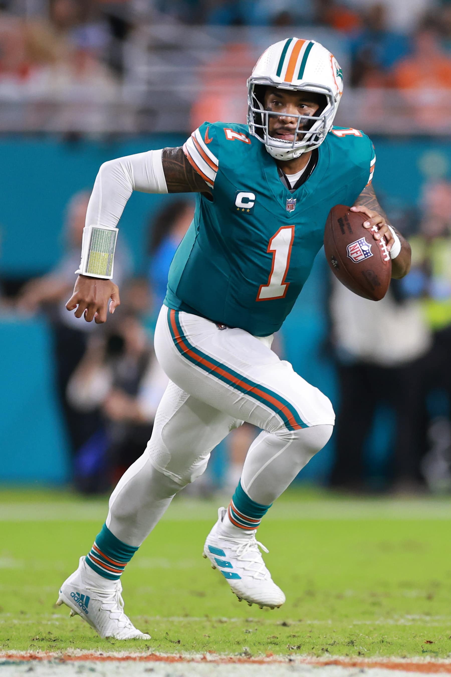 MIAMI GARDENS, FLORIDA - SEPTEMBER 12: Tua Tagovailoa #1 of the Miami Dolphins against the Buffalo Bills at Hard Rock Stadium on September 12, 2024 in Miami Gardens, Florida. (Photo by Carmen Mandato/Getty Images)