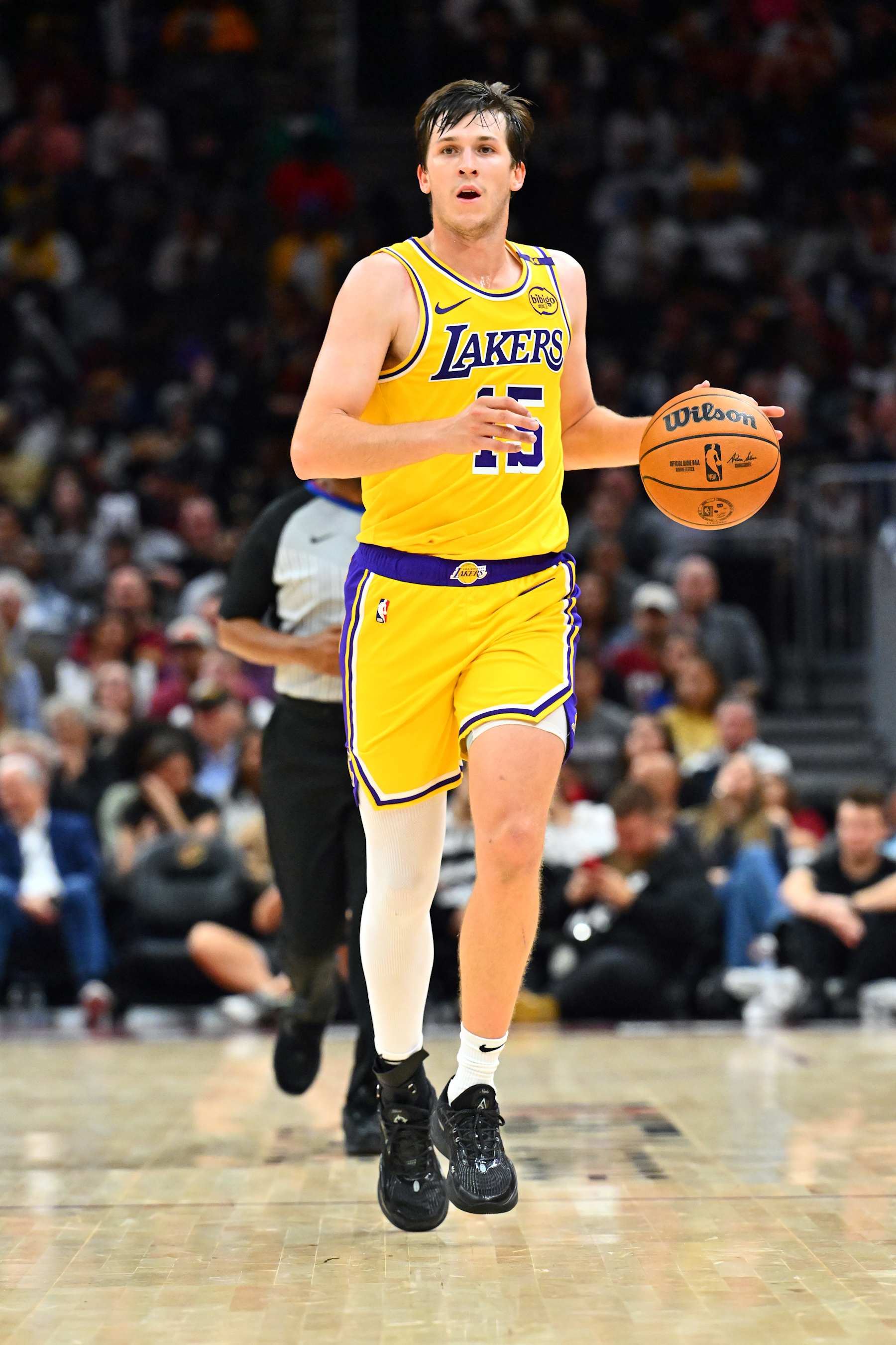 CLEVELAND, OHIO - OCTOBER 30: Austin Reaves #15 of the Los Angeles Lakers brings the ball up court during the second half against the Cleveland Cavaliers at Rocket Mortgage Fieldhouse on October 30, 2024 in Cleveland, Ohio. The Cavaliers defeated the Lakers 134-110. NOTE TO USER: User expressly acknowledges and agrees that, by downloading and or using this photograph, User is consenting to the terms and conditions of the Getty Images License Agreement. (Photo by Jason Miller/Getty Images)