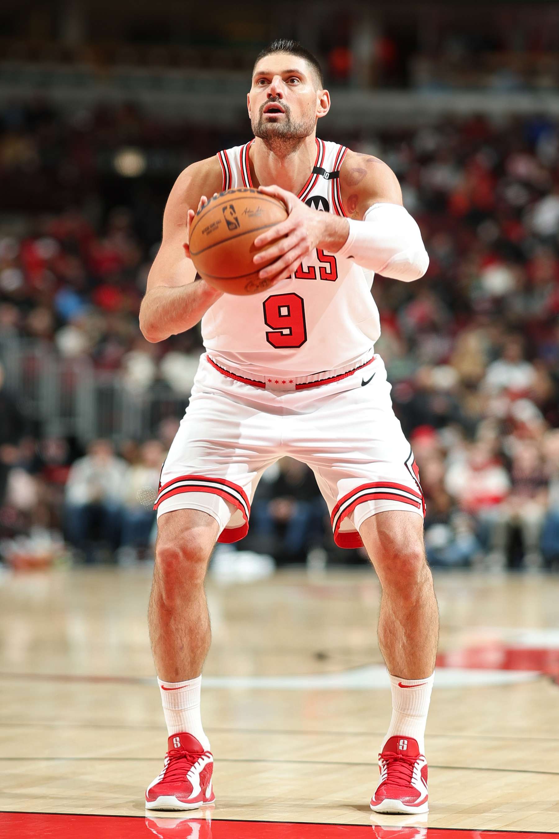 CHICAGO, IL - JANUARY 15: Nikola Vucevic #9 of the Chicago Bulls prepares to shoot a free throw during the game against the Atlanta Hawks on January 15, 2025 at United Center in Chicago, Illinois. NOTE TO USER: User expressly acknowledges and agrees that, by downloading and or using this photograph, User is consenting to the terms and conditions of the Getty Images License Agreement. Mandatory Copyright Notice: Copyright 2025 NBAE (Photo by Jeff Haynes/NBAE via Getty Images)