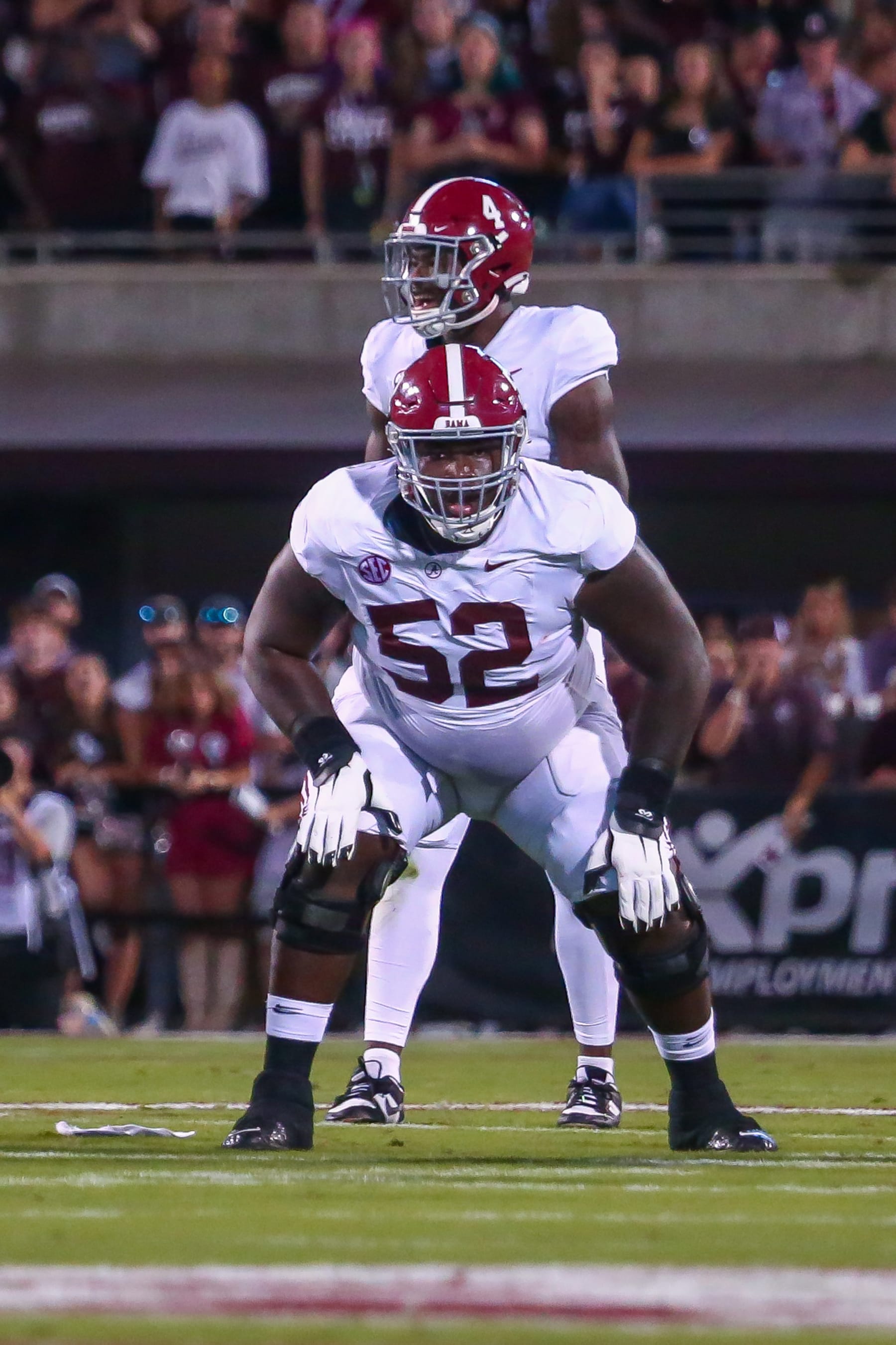 STARKVILLE, MS - SEPTEMBER 30: Alabama Crimson Tide offensive lineman Tyler Booker (52) waits for the snap during the game between the Mississippi State Bulldogs and the Alabama Crimson Tide on September 30, 2023 at Davis Wade Stadium at Scott Field in Starkville, MS. (Photo by Chris McDill/Icon Sportswire via Getty Images)