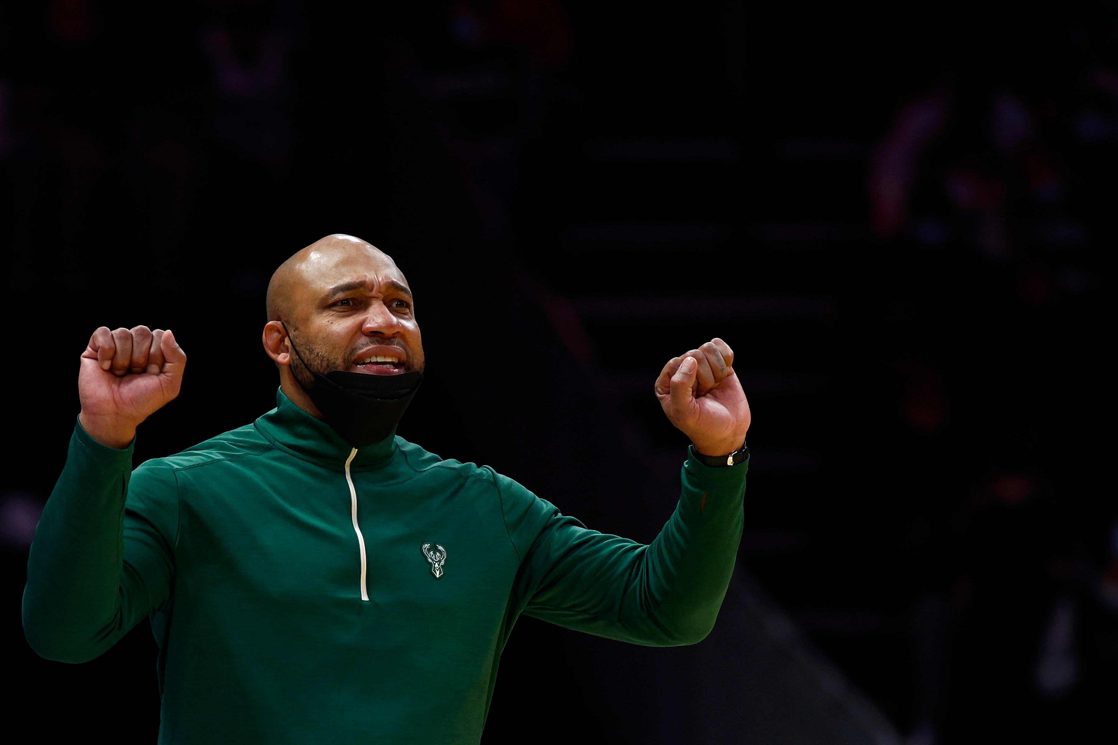 CHARLOTTE, NORTH CAROLINA - JANUARY 08: Acting head coach Darvin Ham of the Milwaukee Bucks reacts during the second half of the game against the Charlotte Hornets at Spectrum Center on January 08, 2022 in Charlotte, North Carolina. NOTE TO USER: User expressly acknowledges and agrees that, by downloading and or using this photograph, User is consenting to the terms and conditions of the Getty Images License Agreement. (Photo by Jared C. Tilton/Getty Images)
