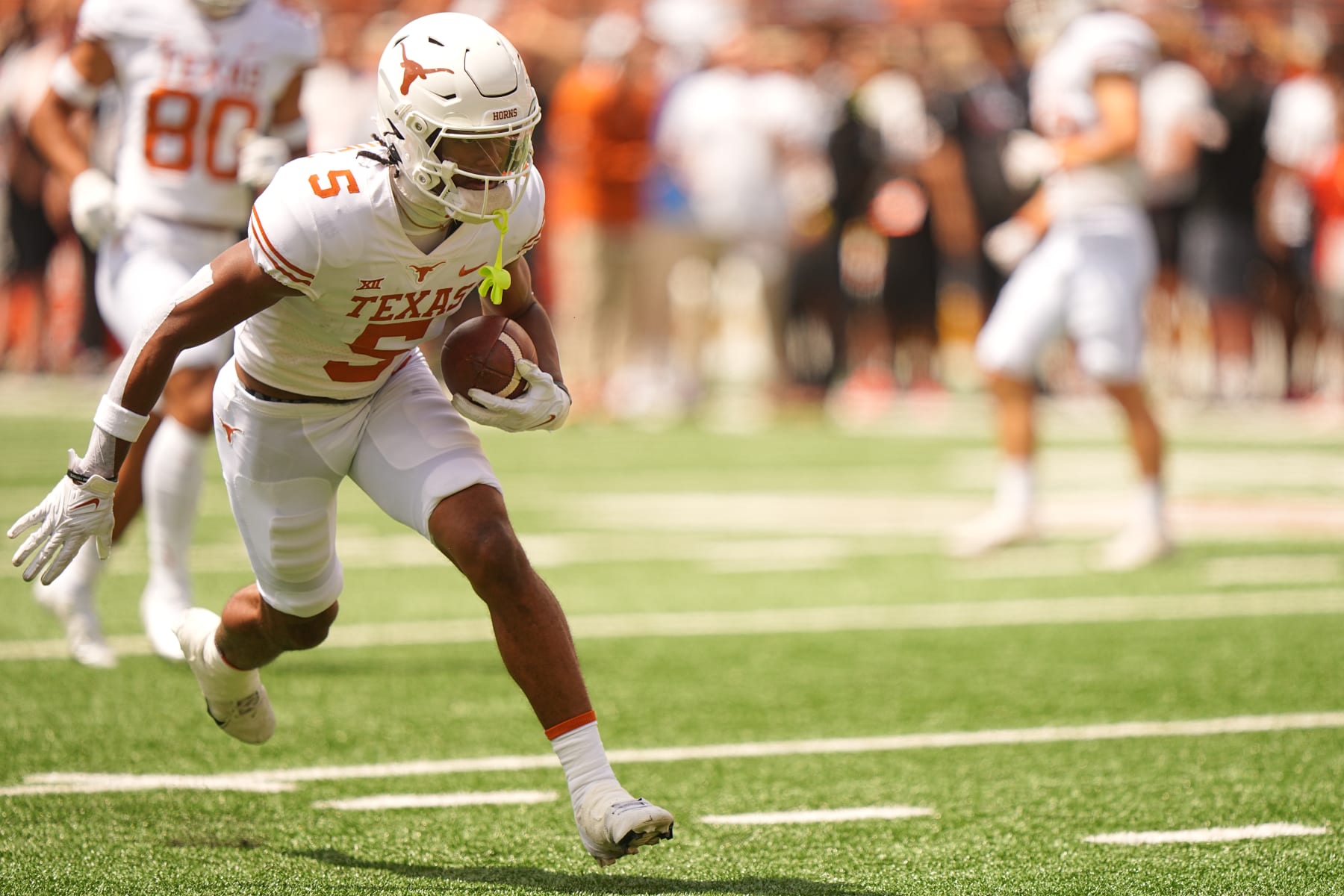 College Football: Texas Adonai Mitchell (5) in action, runs with the football during a spring exhibition game at Darrell K Royal Stadium. 
Austin, TX 4/15/2023
CREDIT: Erick W. Rasco (Photo by Erick W. Rasco /Sports Illustrated via Getty Images) 
(Set Number: X164345 TK1)