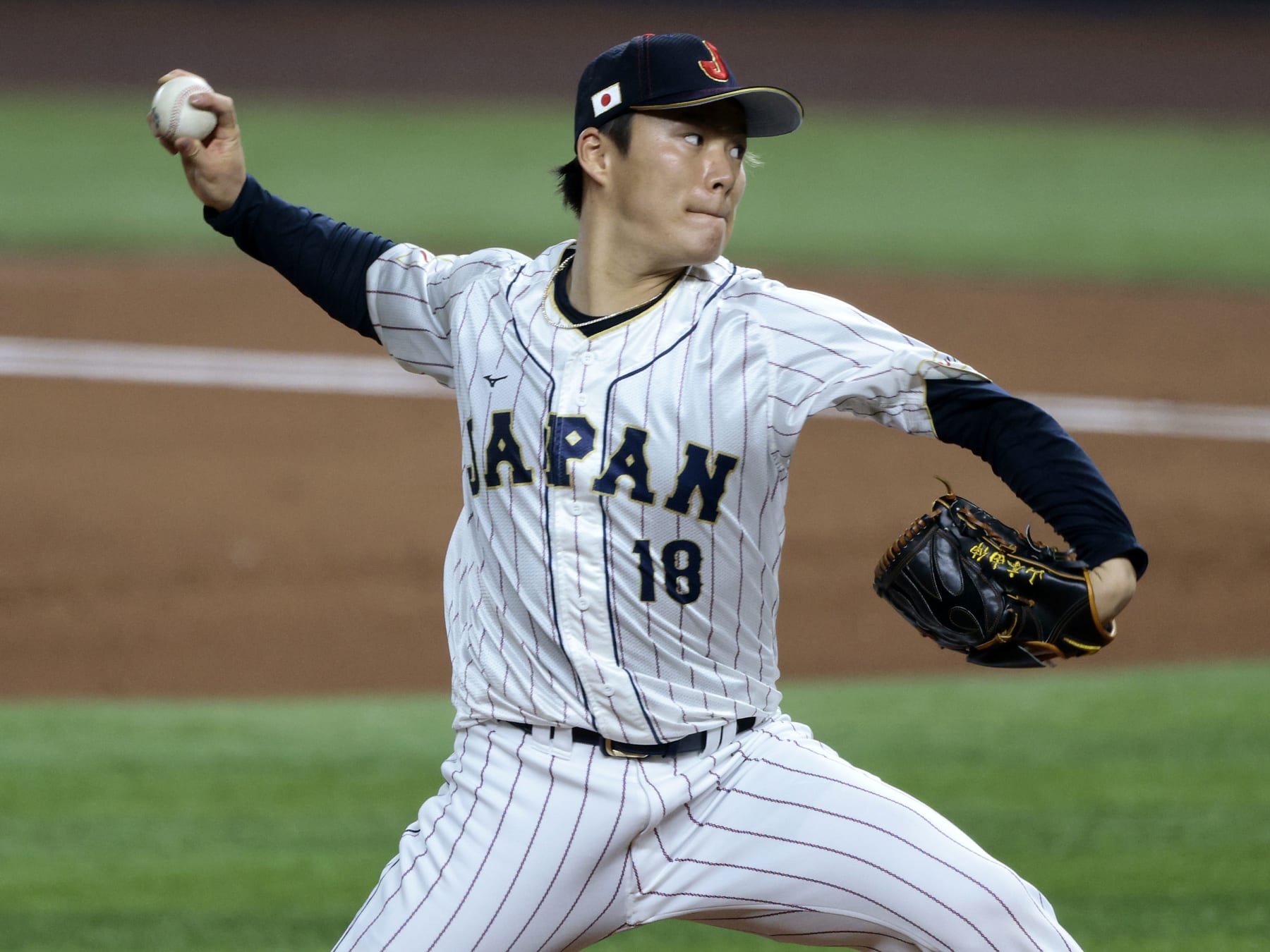 MIAMI, FL - MARCH 20: Yoshinobu Yamamoto #18 of Team Japan pitches during the 2023 World Baseball Classic Semifinal game against Team Mexico at loanDepot Park on Monday, March 20, 2023 in Miami, Florida. (Photo by Christopher Pasatieri/Getty Images)