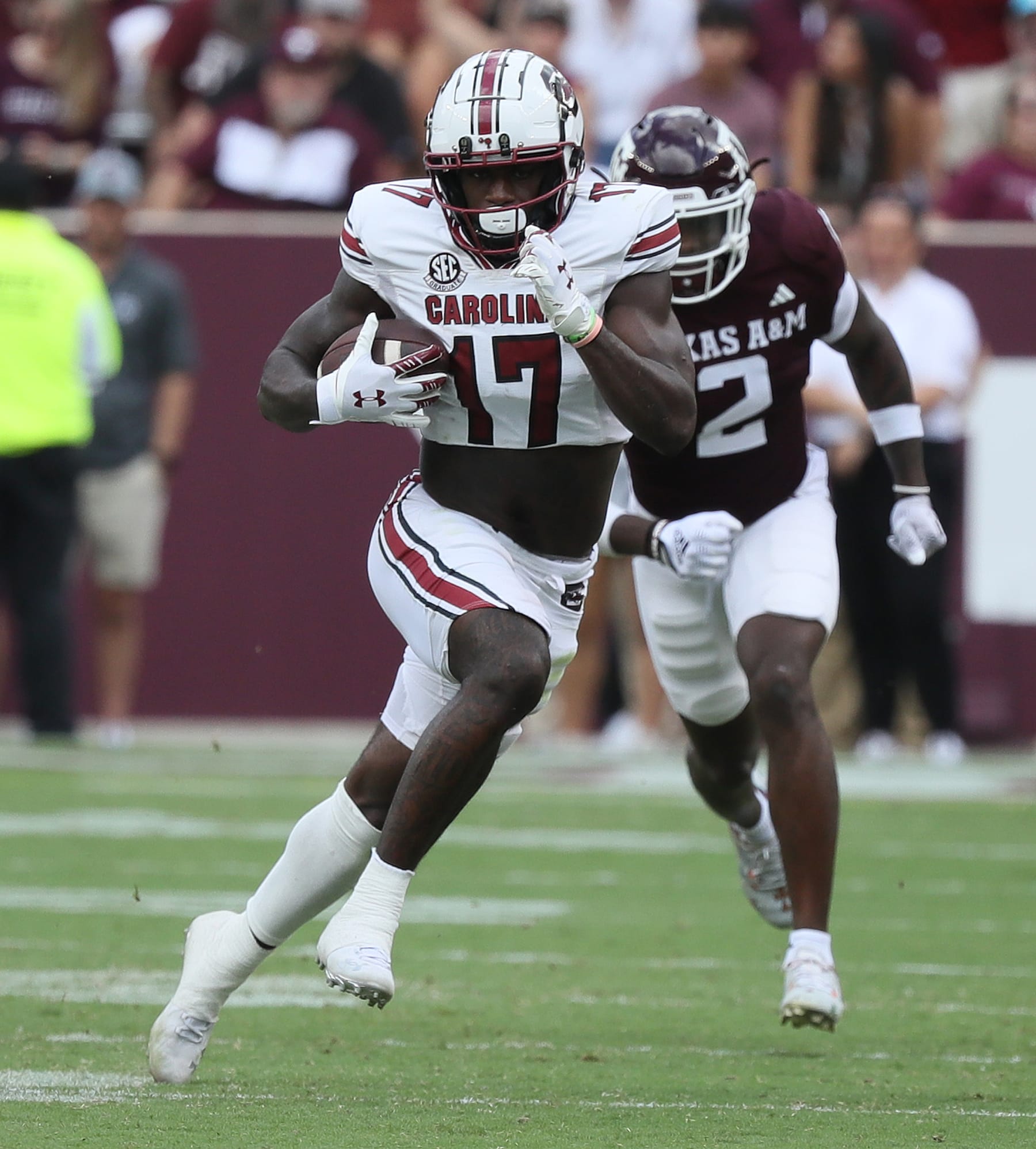 COLLEGE STATION, TEXAS - OCTOBER 28: Xavier Legette #17 of the South Carolina Gamecocks runs with the ball after a catch as Demani Richardson #26 of the Texas A&M Aggies is unable to make the tackle during the second half at Kyle Field on October 28, 2023 in College Station, Texas. (Photo by Bob Levey/Getty Images)