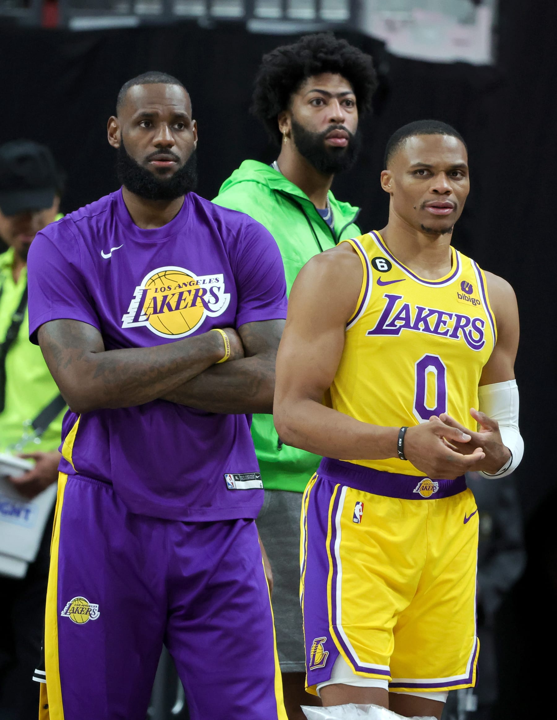 LAS VEGAS, NEVADA - OCTOBER 05: (L-R) LeBron James #6, Anthony Davis #3 and Russell Westbrook #0 of the Los Angeles Lakers react on the sideline after Westbrook was called for a technical foul on the bench in the third quarter of their preseason game against the Phoenix Suns at T-Mobile Arena on October 05, 2022 in Las Vegas, Nevada. The Suns defeated the Lakers 119-115. NOTE TO USER: User expressly acknowledges and agrees that, by downloading and or using this photograph, User is consenting to the terms and conditions of the Getty Images License Agreement. (Photo by Ethan Miller/Getty Images)
