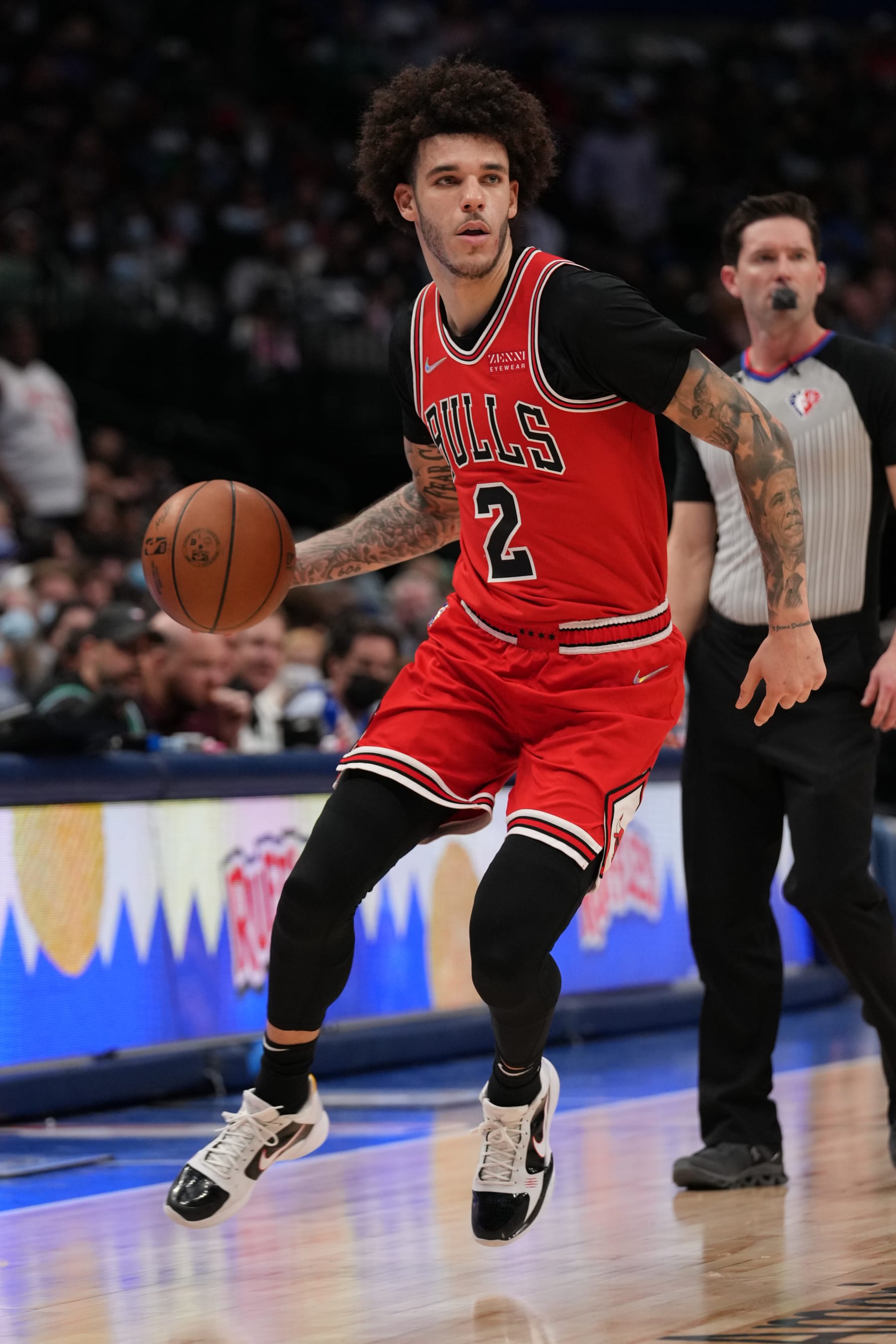 DALLAS, TX - JANUARY 9: Lonzo Ball #2 of the Chicago Bulls dribbles the ball during the game against the Dallas Mavericks on January 9, 2022 at the American Airlines Center in Dallas, Texas. NOTE TO USER: User expressly acknowledges and agrees that, by downloading and or using this photograph, User is consenting to the terms and conditions of the Getty Images License Agreement. Mandatory Copyright Notice: Copyright 2022 NBAE (Photo by Glenn James/NBAE via Getty Images)