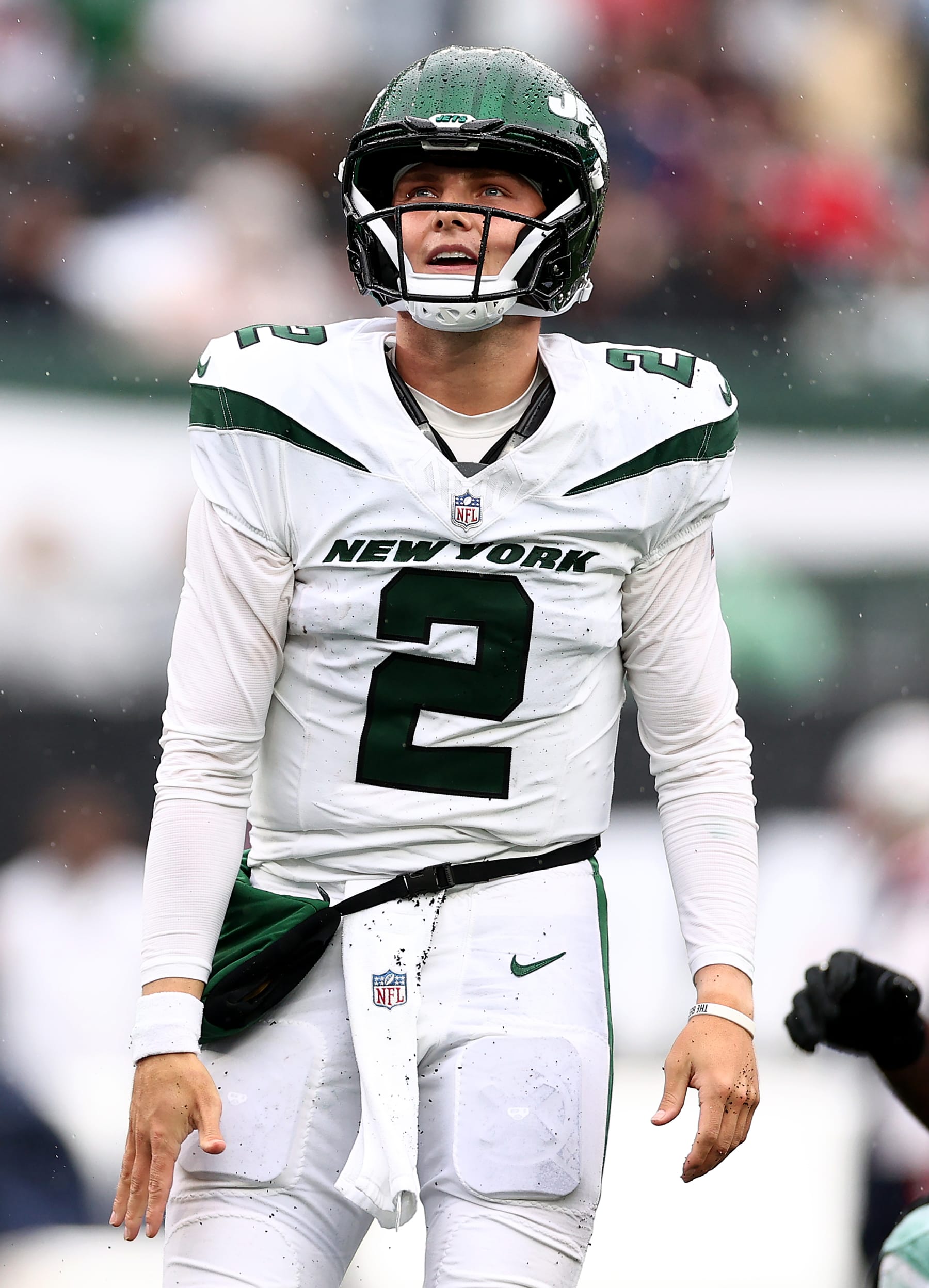 EAST RUTHERFORD, NEW JERSEY - SEPTEMBER 24: Zach Wilson #2 of the New York Jets reacts after getting pressure from the New England Patriots at MetLife Stadium on September 24, 2023 in East Rutherford, New Jersey. (Photo by Elsa/Getty Images)