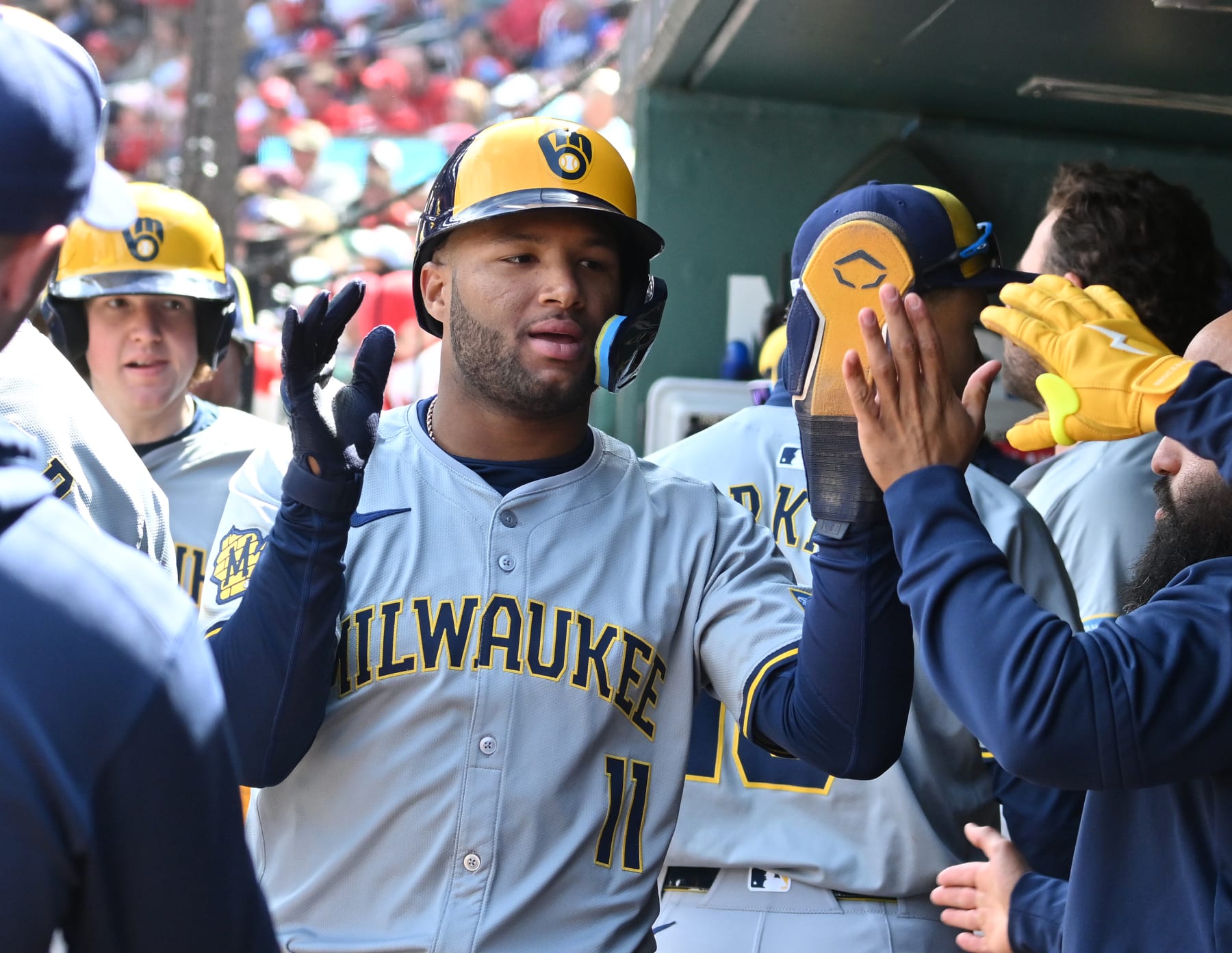 ST. LOUIS, MO - APRIL 20: Milwaukee Brewers right fielder Jackson Chourio (11) is congratulated by teammates after scoring during a MLB game on April 20, 2024, between the Milwaukee Brewers and the St. Louis Cardinals at Busch Stadium, St. Louis, MO.  (Photo by Keith Gillett/Icon Sportswire via Getty Images)