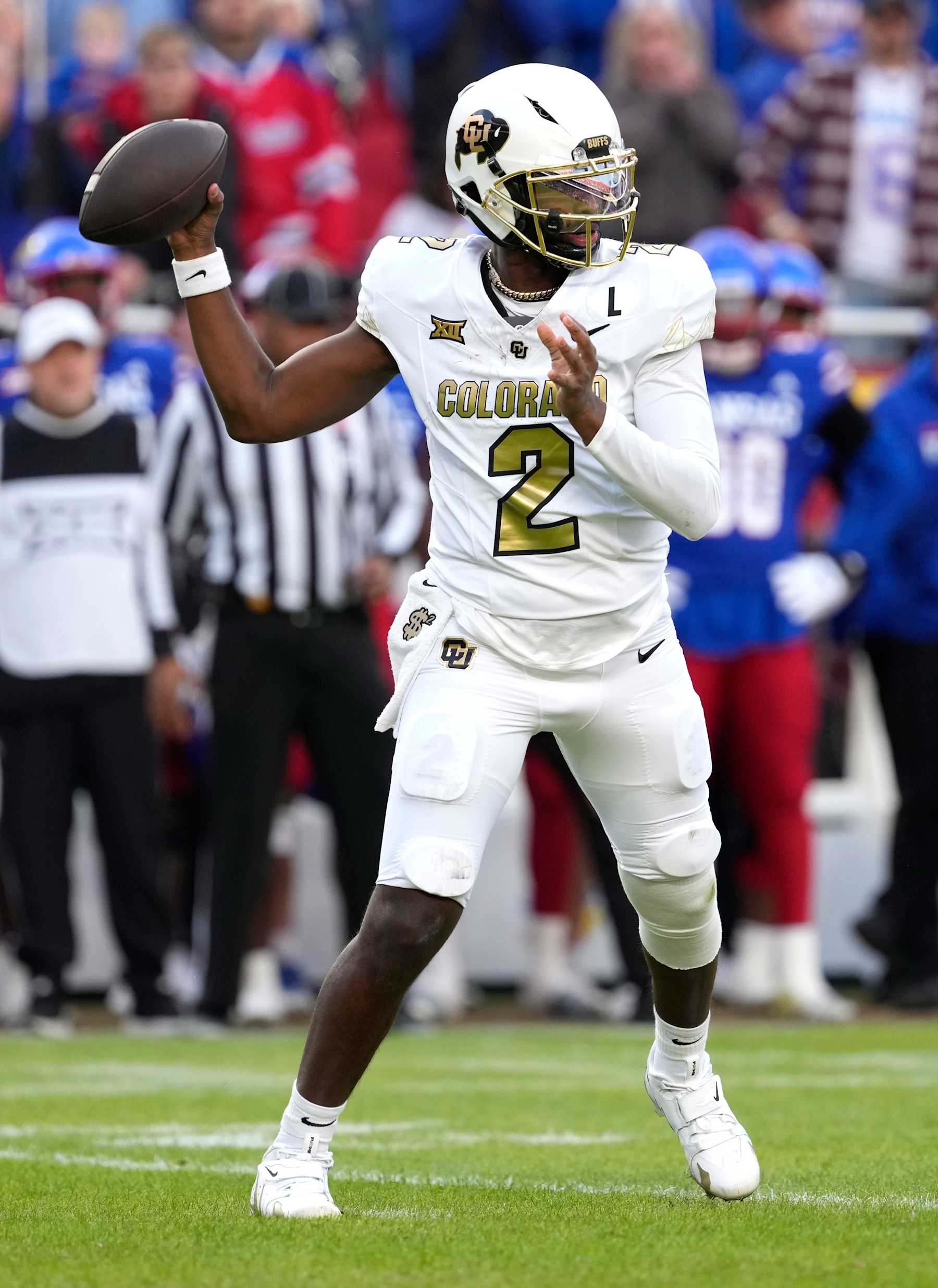 KANSAS CITY, MISSOURI - NOVEMBER 23: Quarterback Shedeur Sanders #2 of the Colorado Buffaloes passes in the first half against the Kansas Jayhawks at Arrowhead Stadium on November 23, 2024 in Kansas City, Missouri.  (Photo by Ed Zurga/Getty Images)