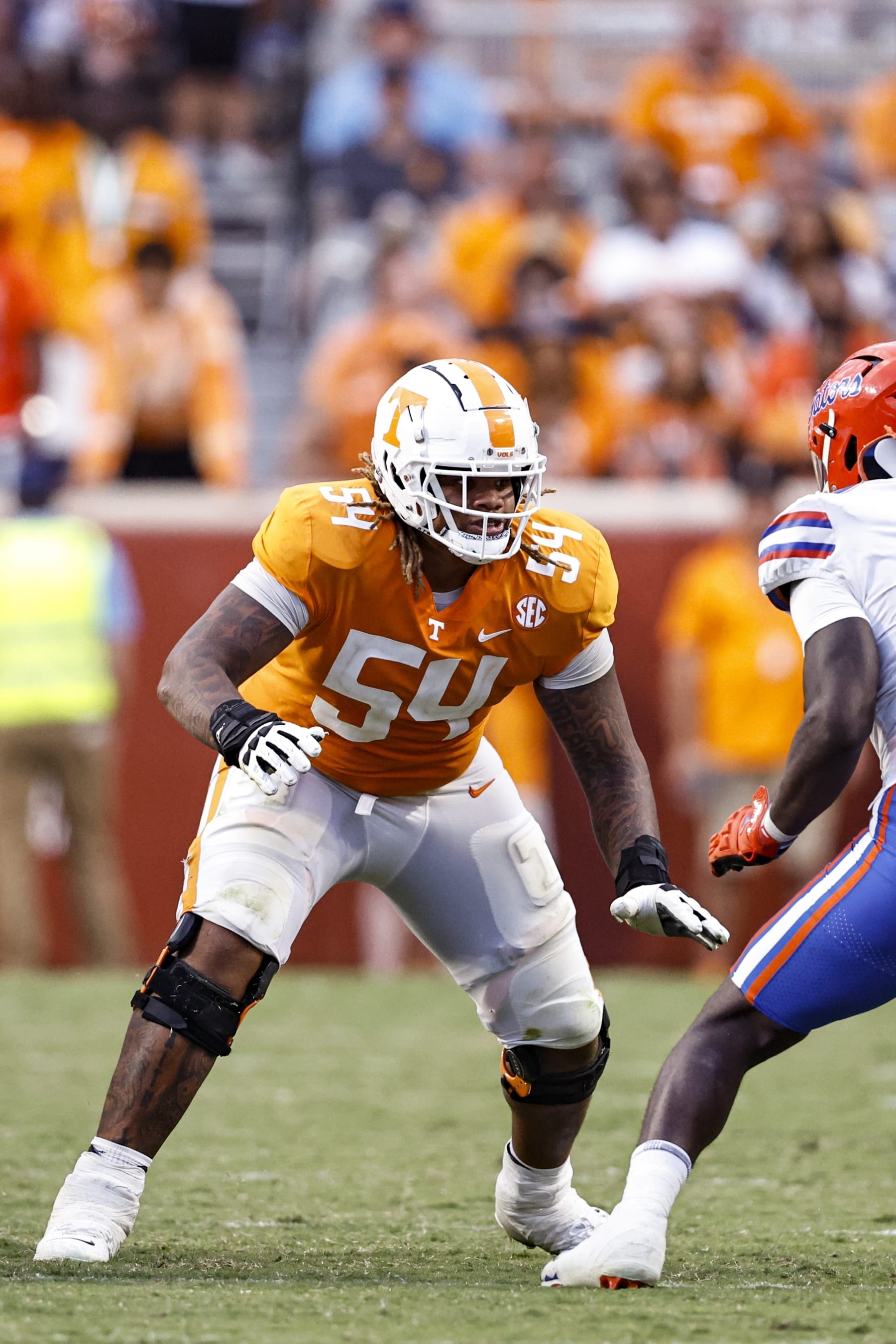 Tennessee offensive lineman Gerald Mincey (54) blocks during the second half of an NCAA college football game against Florida Saturday, Sept. 24, 2022, in Knoxville, Tenn. Tennessee won 38-33. (AP Photo/Wade Payne)