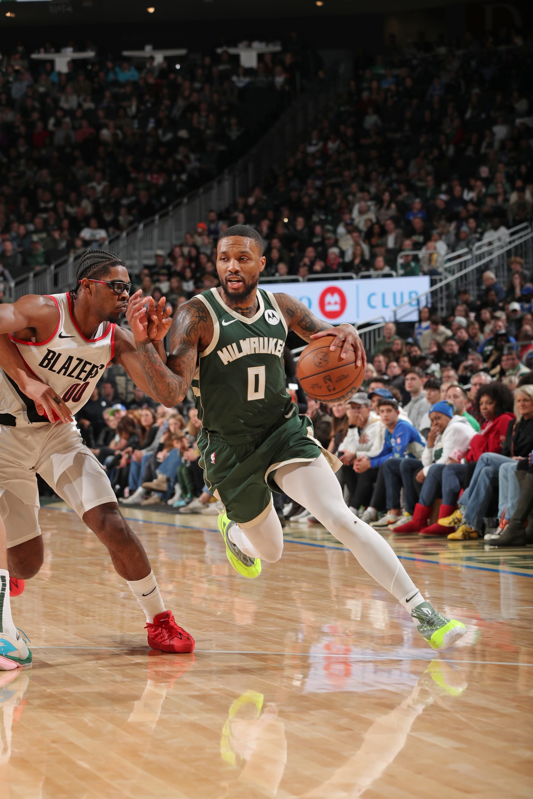 MILWAUKEE, WI - NOVEMBER 26: Damian Lillard #0 of the Milwaukee Bucks dribbles the ball during the game against the Portland Trail Blazers on November 26, 2023 at the Fiserv Forum Center in Milwaukee, Wisconsin. NOTE TO USER: User expressly acknowledges and agrees that, by downloading and or using this Photograph, user is consenting to the terms and conditions of the Getty Images License Agreement. Mandatory Copyright Notice: Copyright 2023 NBAE (Photo by Gary Dineen/NBAE via Getty Images).