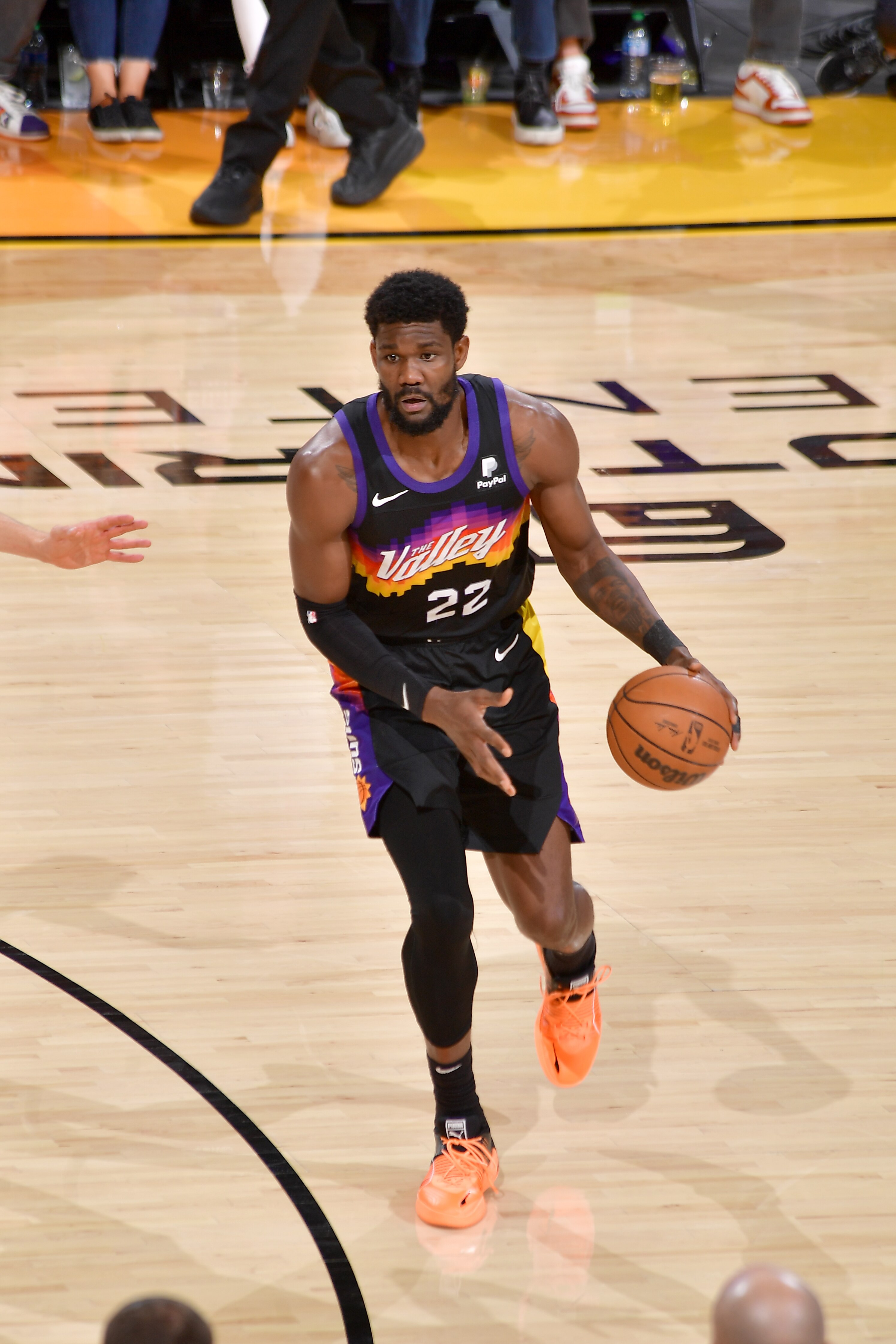 PHOENIX, AZ - MAY 15: Deandre Ayton #22 of the Phoenix Suns dribbles the ball during the game against the Dallas Mavericks during Game 7 of the 2022 NBA Playoffs Western Conference Semifinals on May 15, 2022 at Footprint Center in Phoenix, Arizona. NOTE TO USER: User expressly acknowledges and agrees that, by downloading and or using this photograph, user is consenting to the terms and conditions of the Getty Images License Agreement. Mandatory Copyright Notice: Copyright 2022 NBAE (Photo by Michael Gonzales/NBAE via Getty Images)