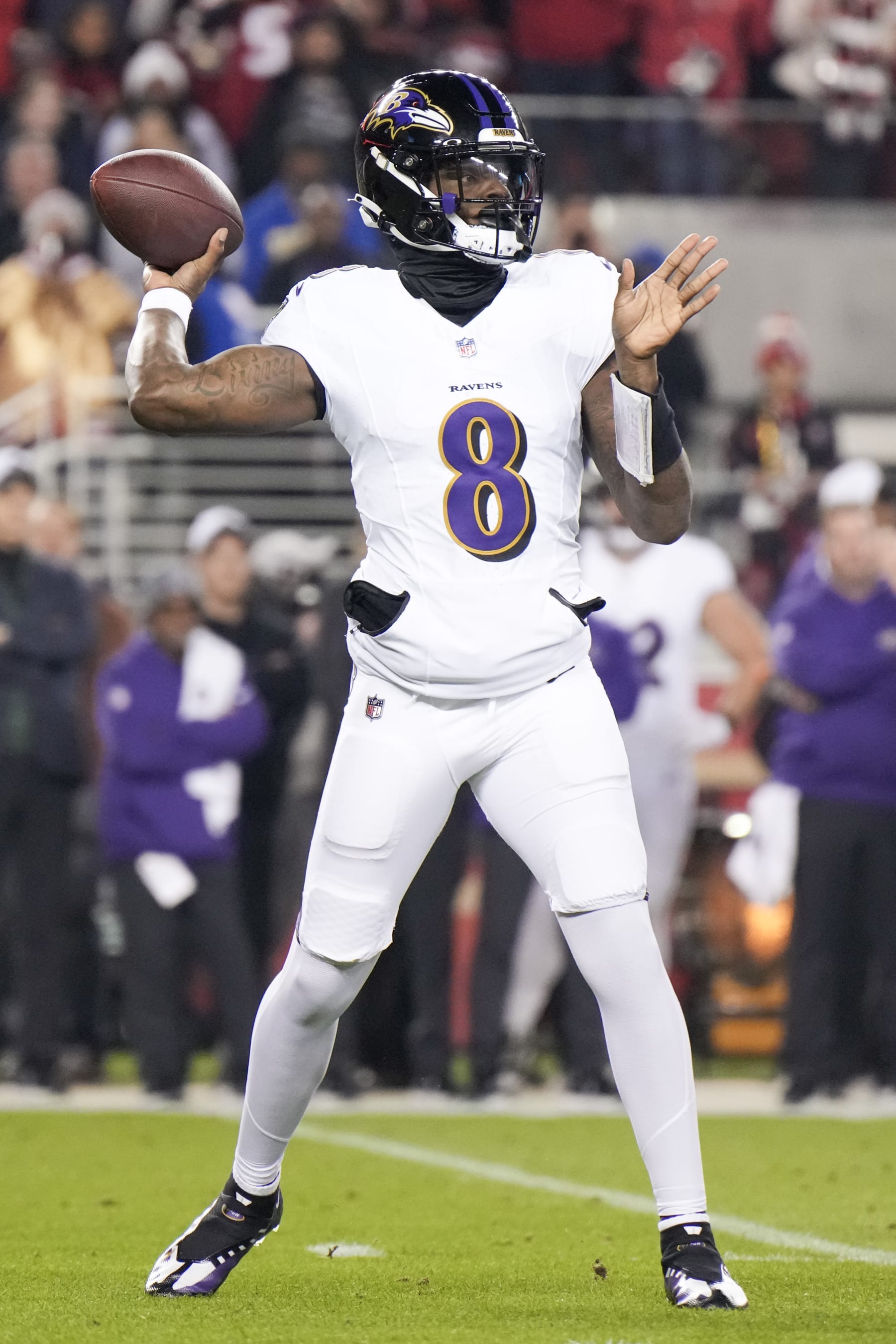 SANTA CLARA, CALIFORNIA - DECEMBER 25: Lamar Jackson #8 of the Baltimore Ravens attempts a pass during the first quarter against the San Francisco 49ers at Levi's Stadium on December 25, 2023 in Santa Clara, California. (Photo by Loren Elliott/Getty Images)