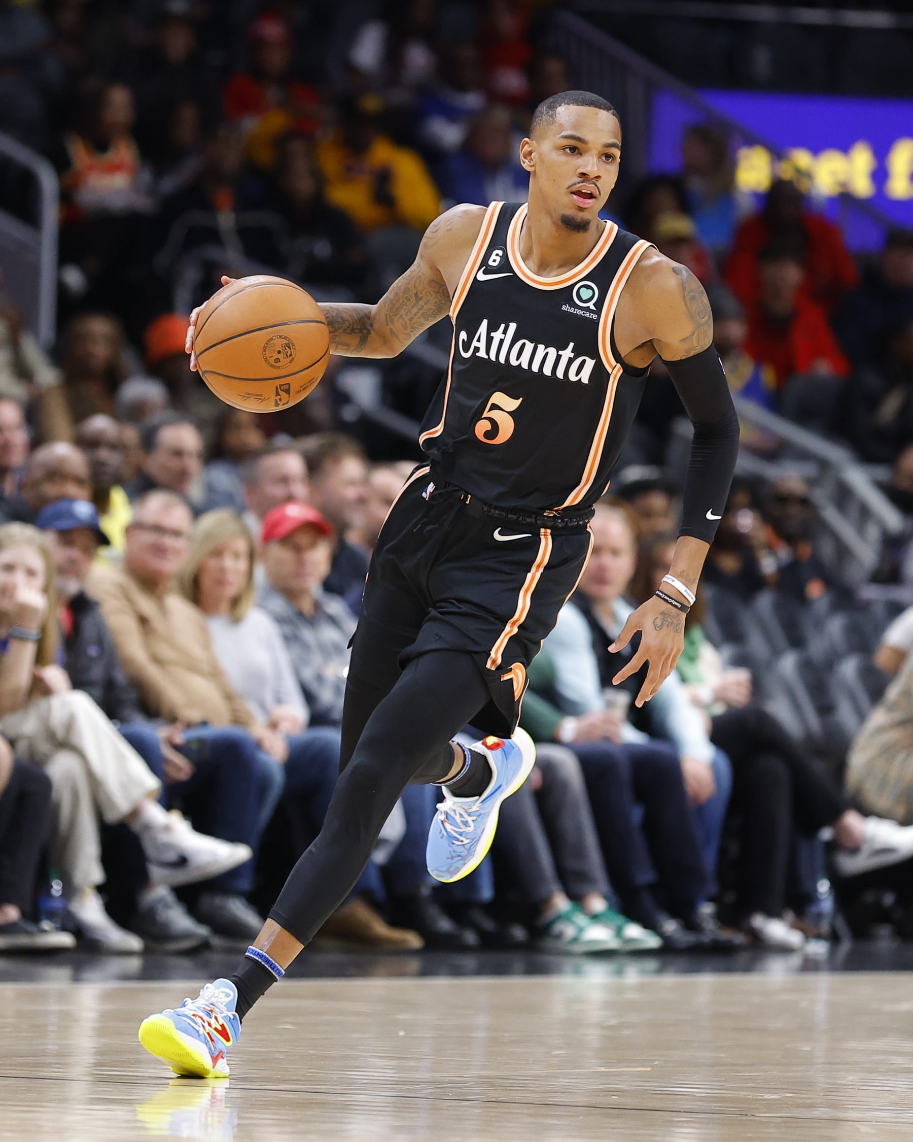 ATLANTA, GA - MARCH 17: Dejounte Murray #5 of the Atlanta Hawks drives down the court during the first half against the Golden State Warriors at State Farm Arena on March 17, 2023 in Atlanta, Georgia. NOTE TO USER: User expressly acknowledges and agrees that, by downloading and or using this photograph, User is consenting to the terms and conditions of the Getty Images License Agreement. (Photo by Todd Kirkland/Getty Images)