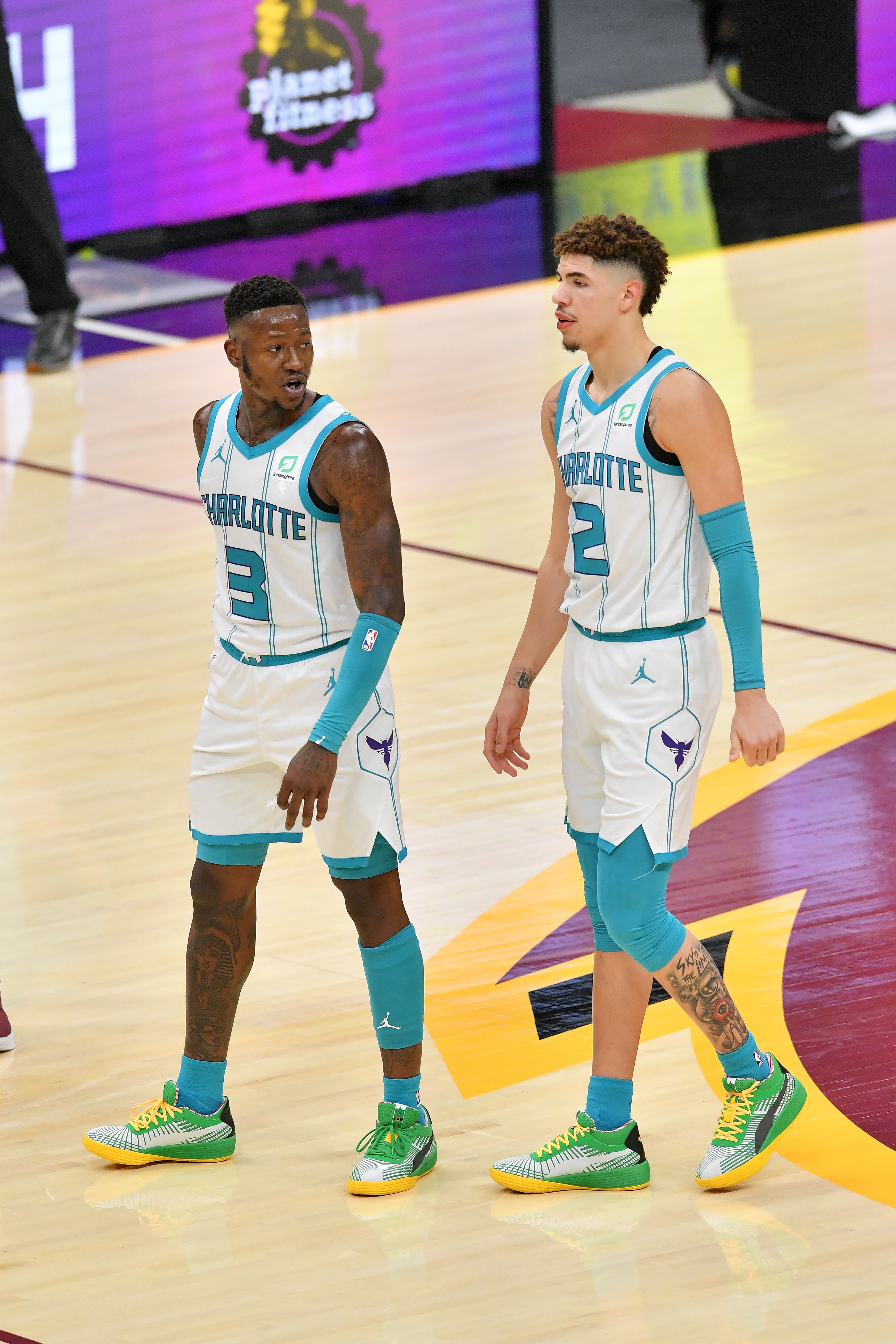 CLEVELAND, OHIO - DECEMBER 23: Terry Rozier #3 talks to LaMelo Ball #2 of the Charlotte Hornets during the third quarter against the Cleveland Cavaliers at Rocket Mortgage Fieldhouse on December 23, 2020 in Cleveland, Ohio. NOTE TO USER: User expressly acknowledges and agrees that, by downloading and/or using this photograph, user is consenting to the terms and conditions of the Getty Images License Agreement. (Photo by Jason Miller/Getty Images)